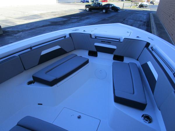 2025 Sea Pro 292 Offshore boat interior with cushioned seating.