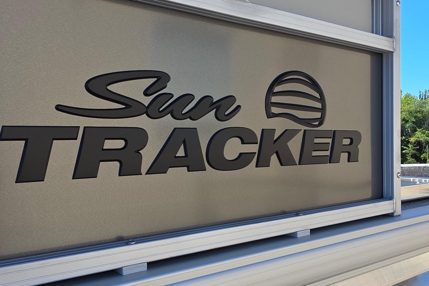 2026 Sun Tracker BB 16 XLS logo on a metallic surface, outdoors.