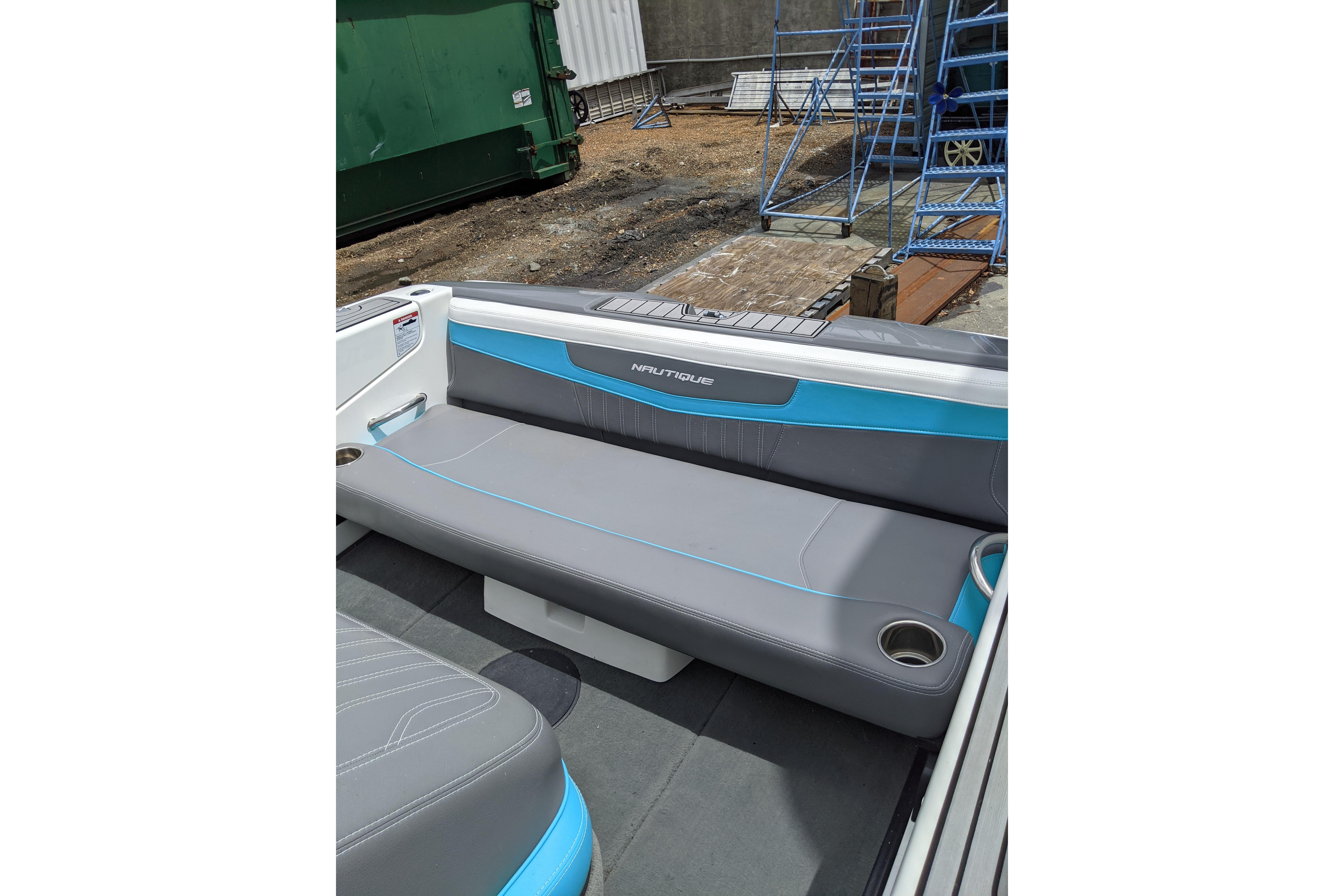 2016 Nautique Ski Nautique 200 Closed Bow interior with gray and blue seating.