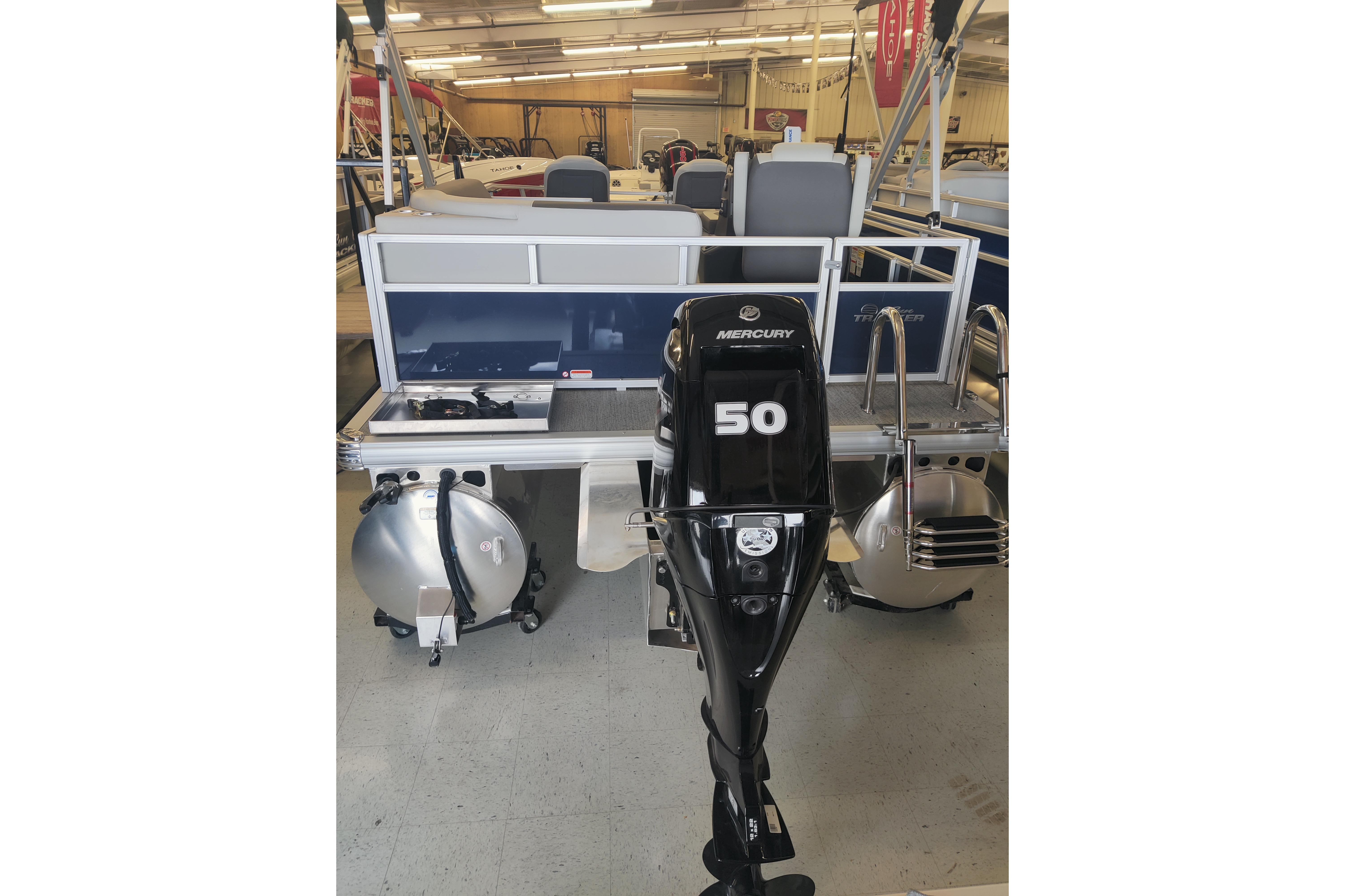 2026 Sun Tracker Bass Buggy 16 XL Select with Mercury 50 engine in showroom.
