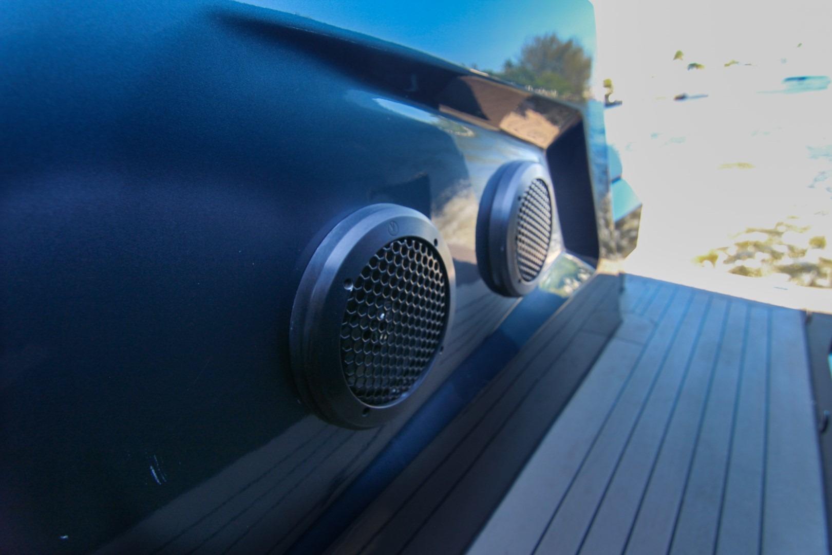 Close-up of 2022 Vanquish Yachts VQ45 exterior detail with speakers on deck.