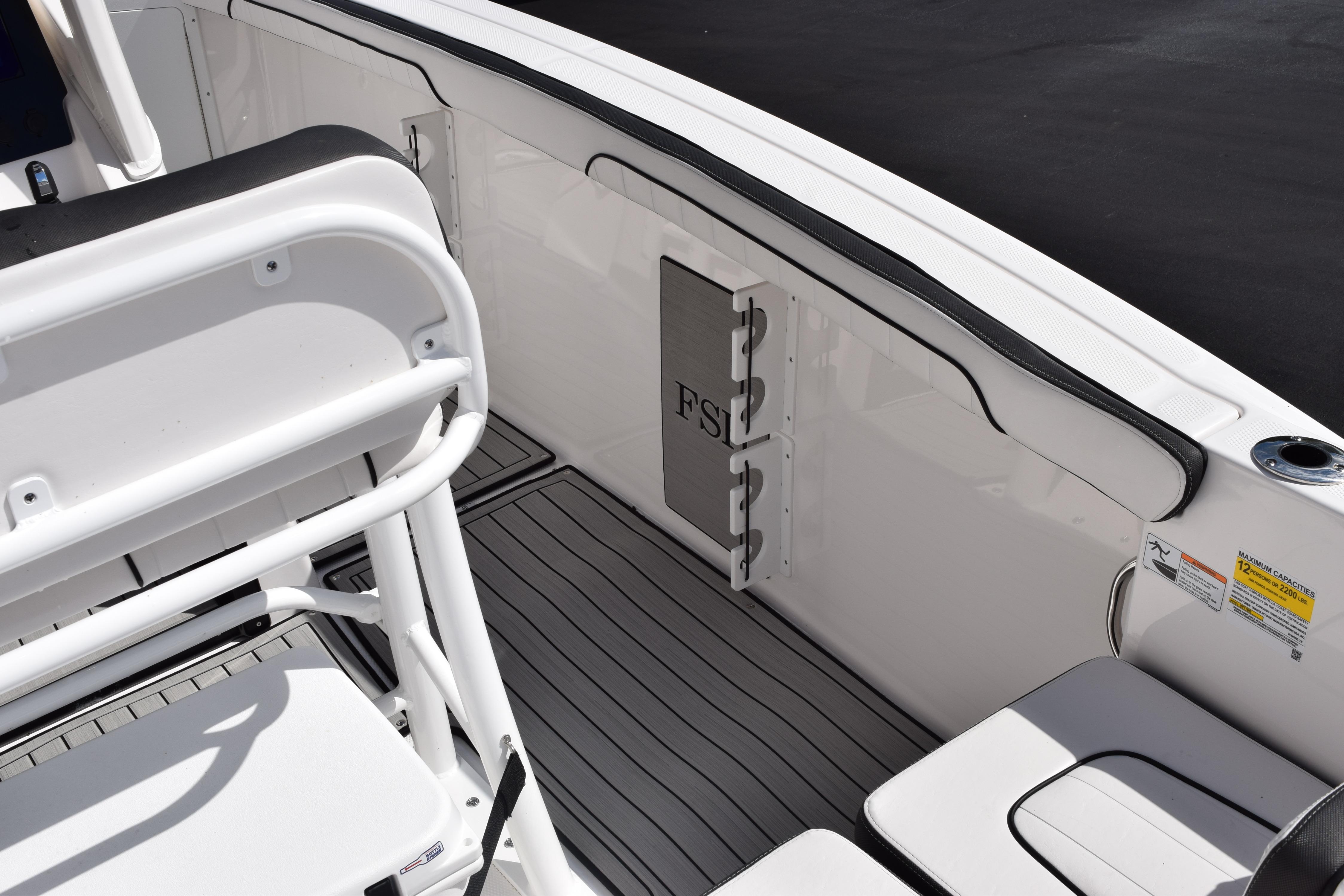 Interior view of 2026 Yamaha Boats 255 FSH Sport H, featuring seating and deck details.