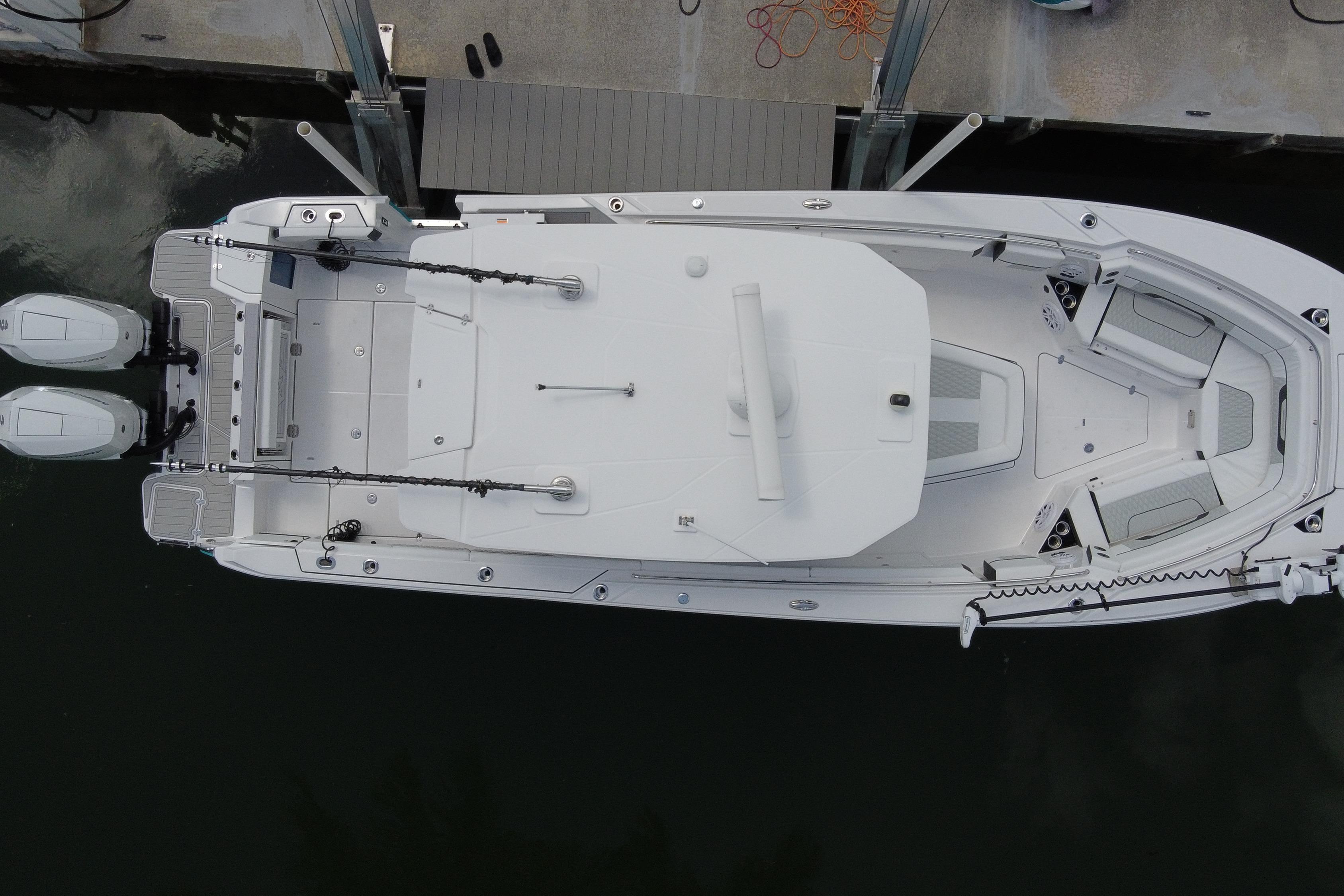 Overhead view of 2024 Blackfin 332 CC boat docked with dual engines.