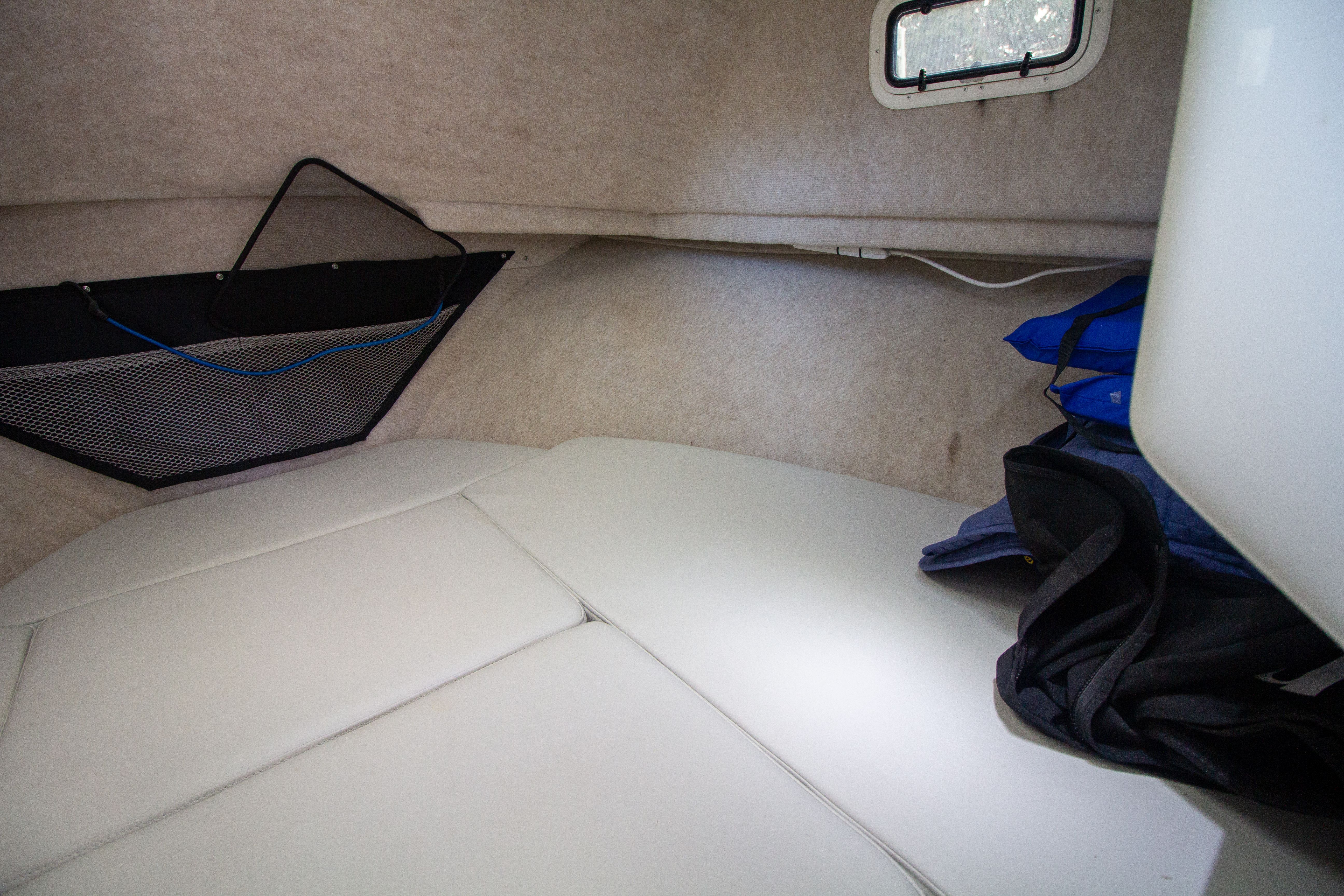 Interior of 2022 Parker 2520 XLD Sport Cabin with storage area.