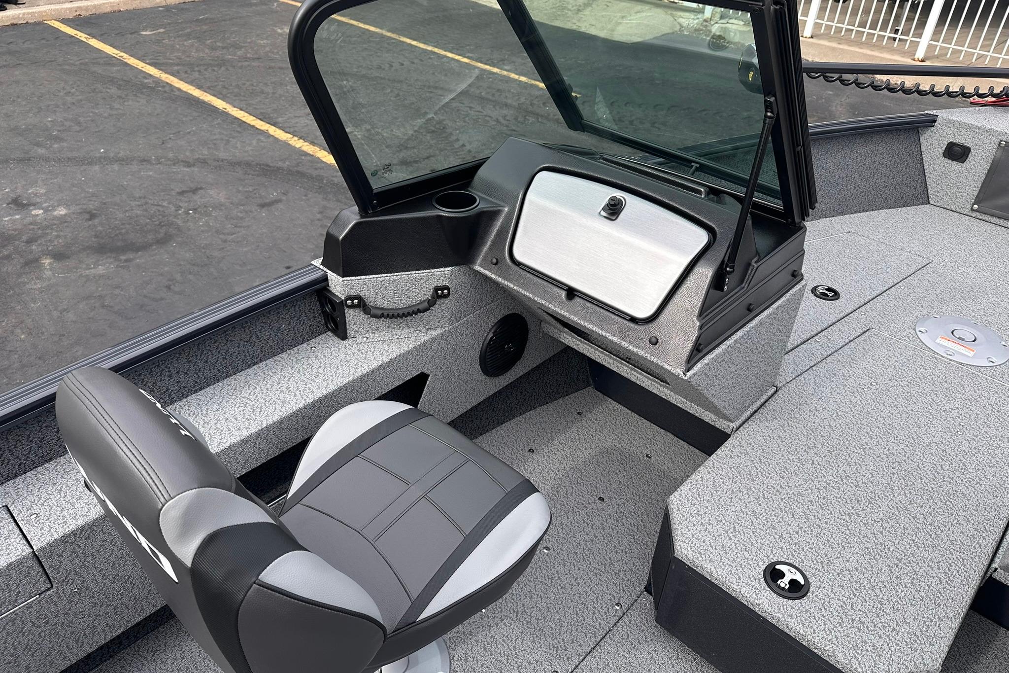 2026 Lund 1775 Adventure Sport boat interior with seating and dashboard.