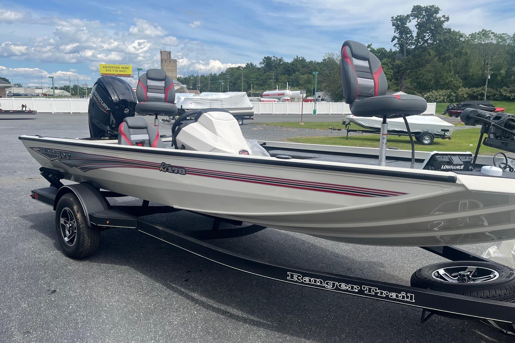 2025 Ranger RT178 fishing boat on trailer, featuring sleek design and comfortable seating.