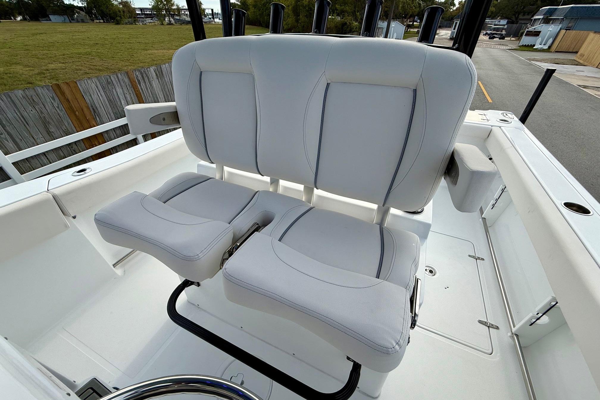 2026 Sea Hunt Gamefish 30 Coffin Box boat seating area, featuring dual cushioned seats.