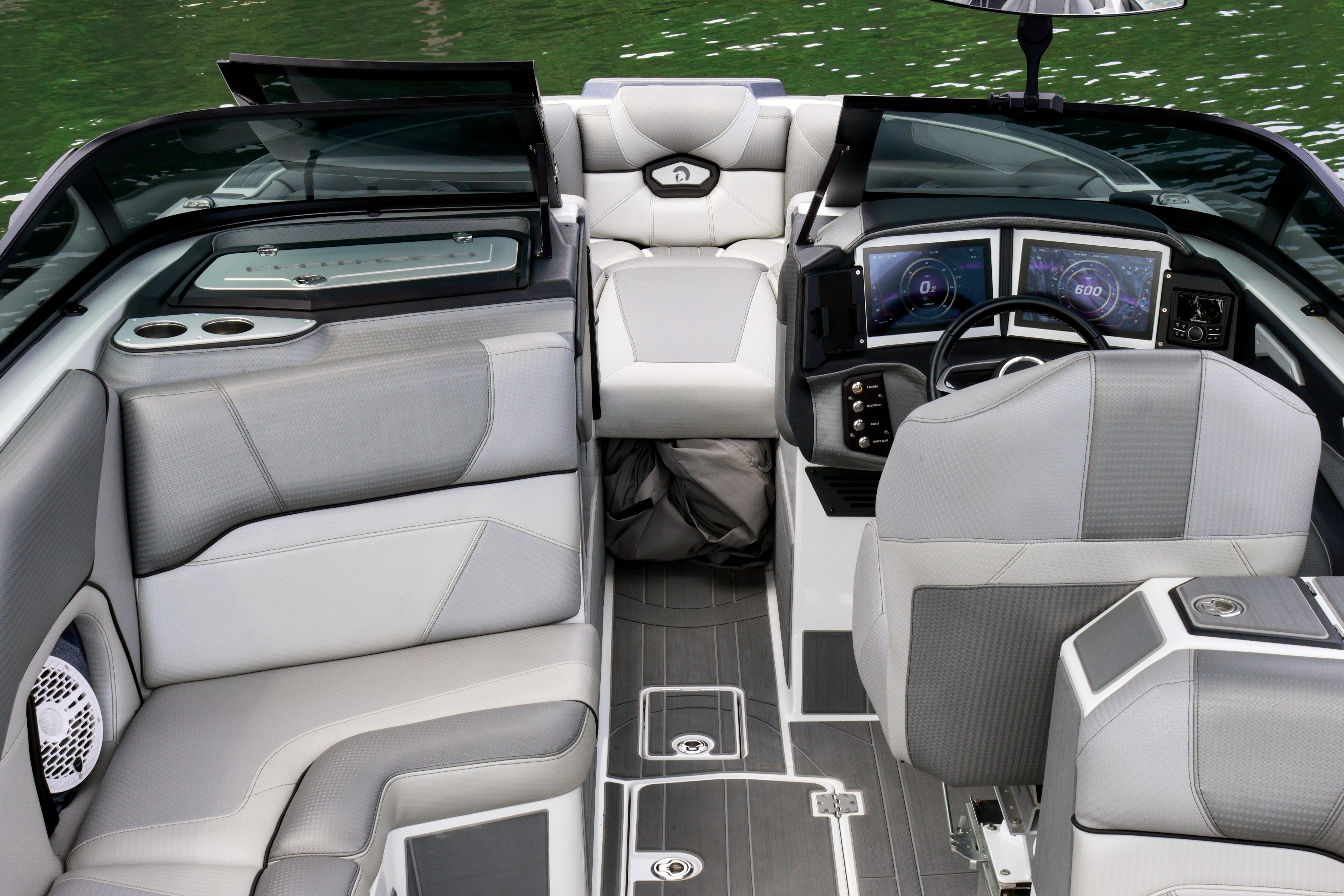 2022 Centurion Ri245 boat interior with modern dashboard and luxurious seating.