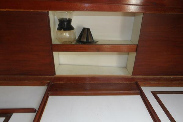 Wooden interior shelf with coffee pot and filter, Tartan T 37, 1979 model.