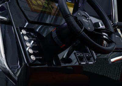 Steering console of 2025 Brig Eagle 6.7 PVC boat with control buttons.