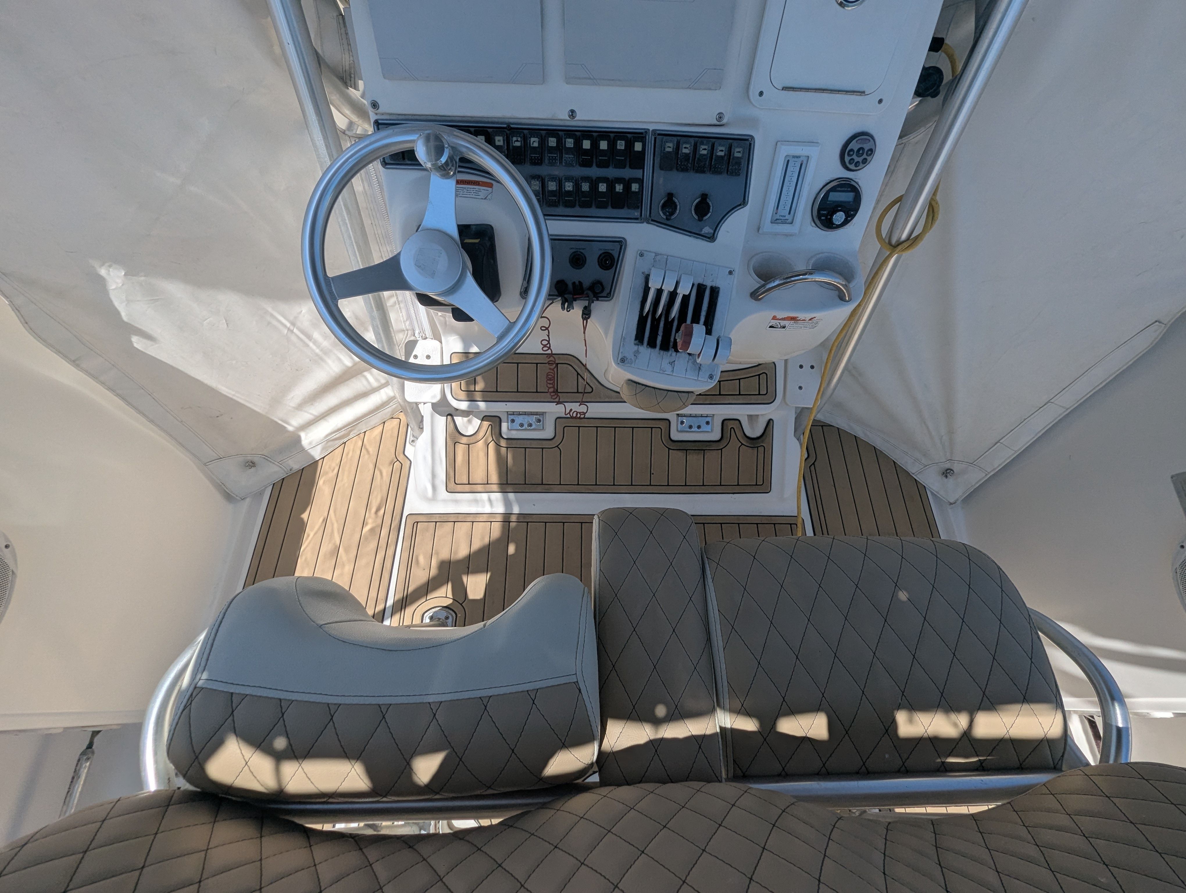 Interior view of a 2005 Wellcraft 35 CCF boat cockpit.