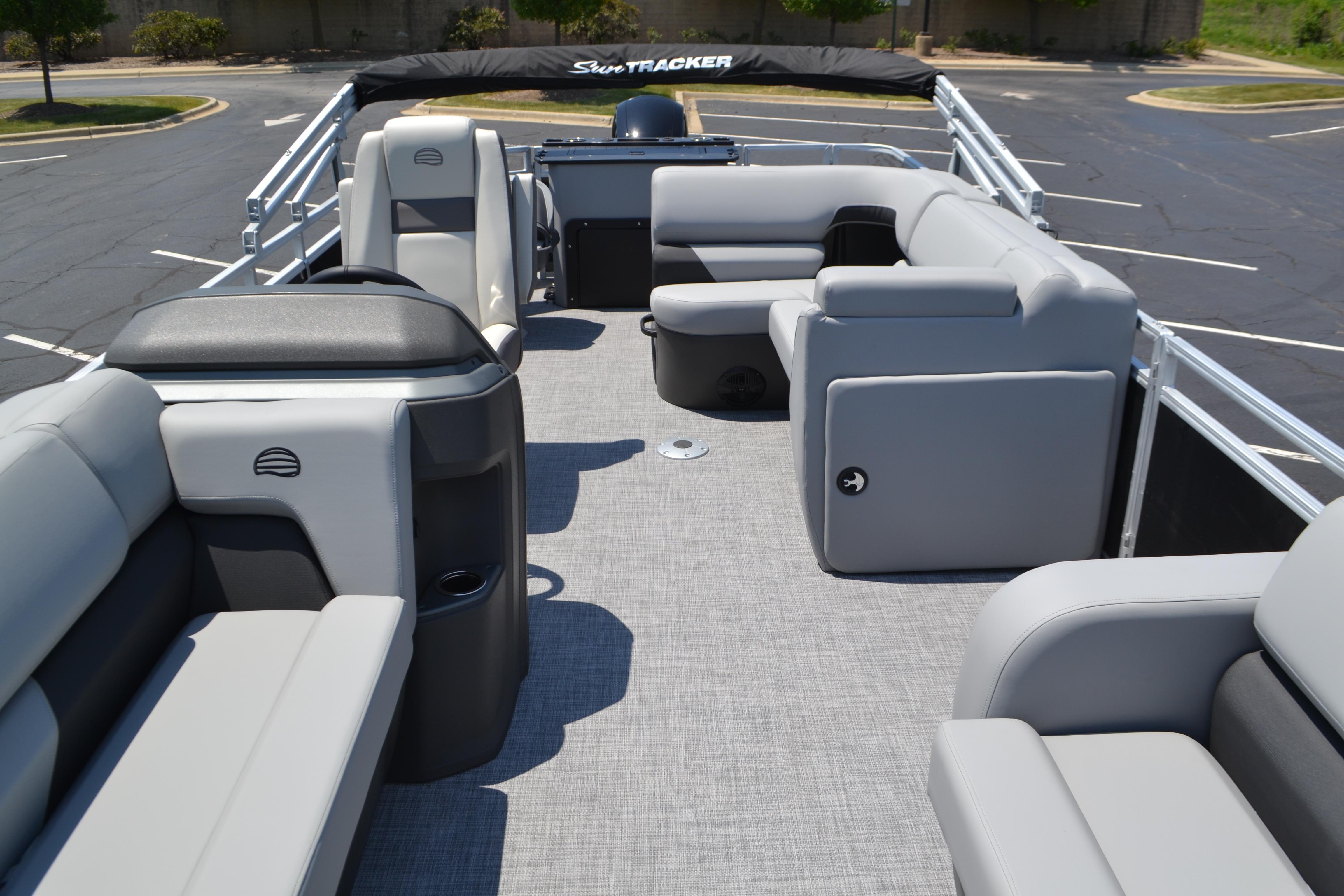 2026 Sun Tracker SportFish 22 DLX pontoon boat with spacious seating and modern design.