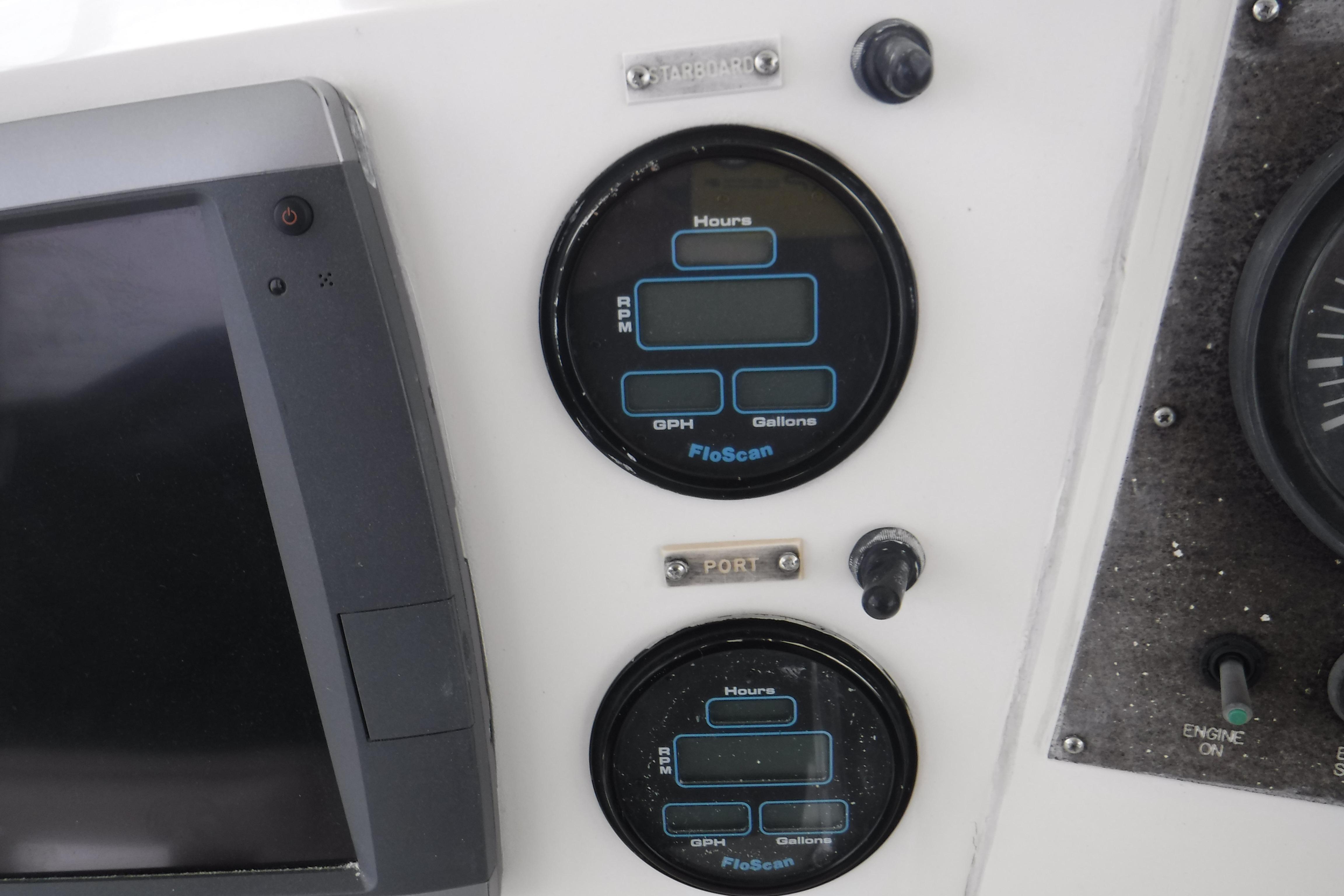 Control panel of a 1989 Viking 41 Sportfish Convertible with FloScan gauges.