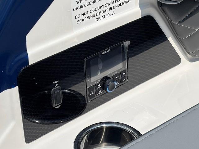 2026 Chaparral SSX 6 boat dashboard with control panel and cup holder.