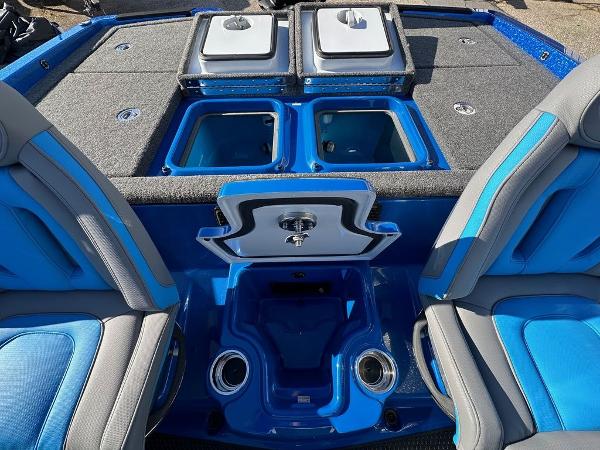 2024 iKon LX 20 boat interior with blue and gray seating, storage compartments, and cup holders.