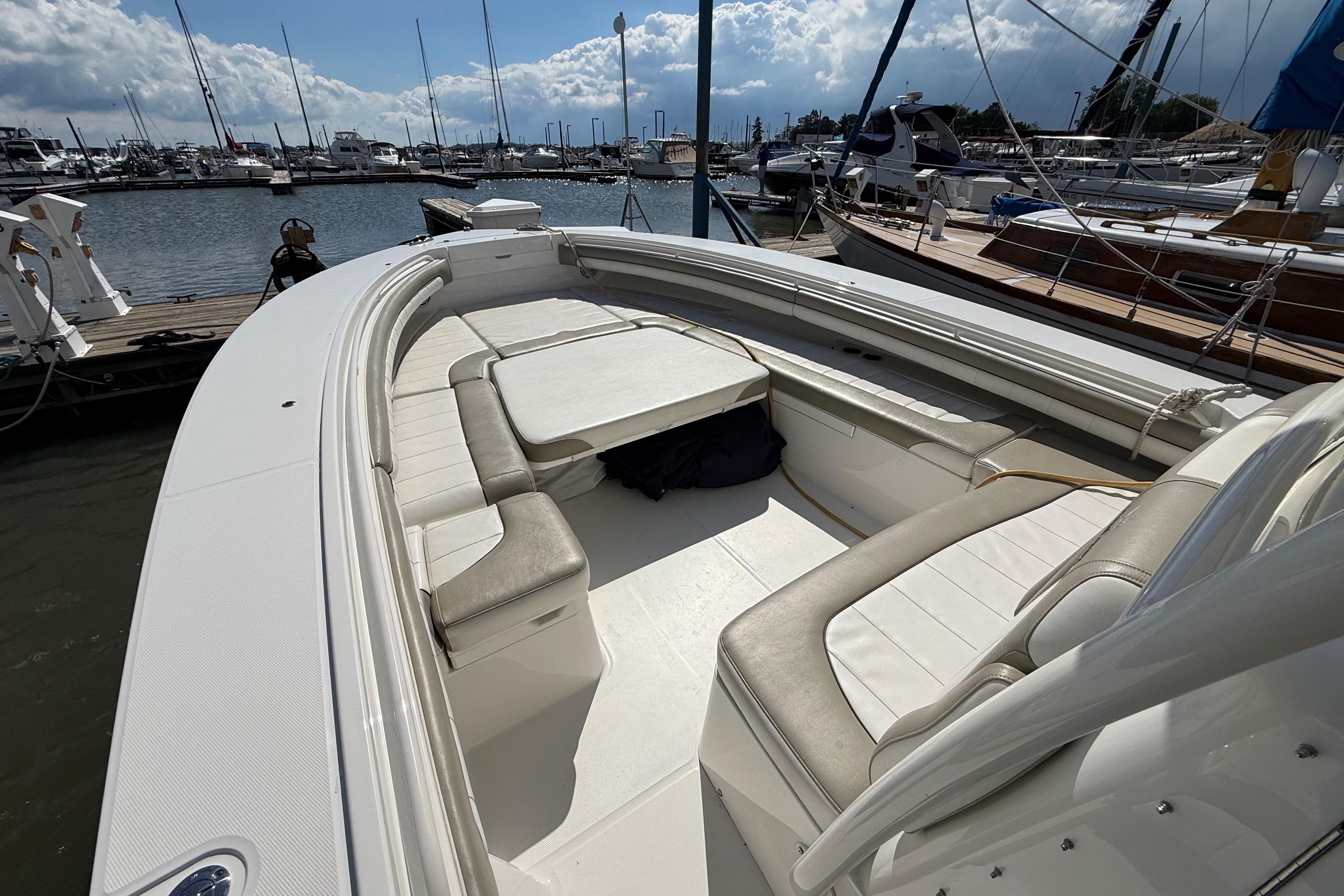 2019 Regulator 34SS boat interior with spacious seating at a marina.