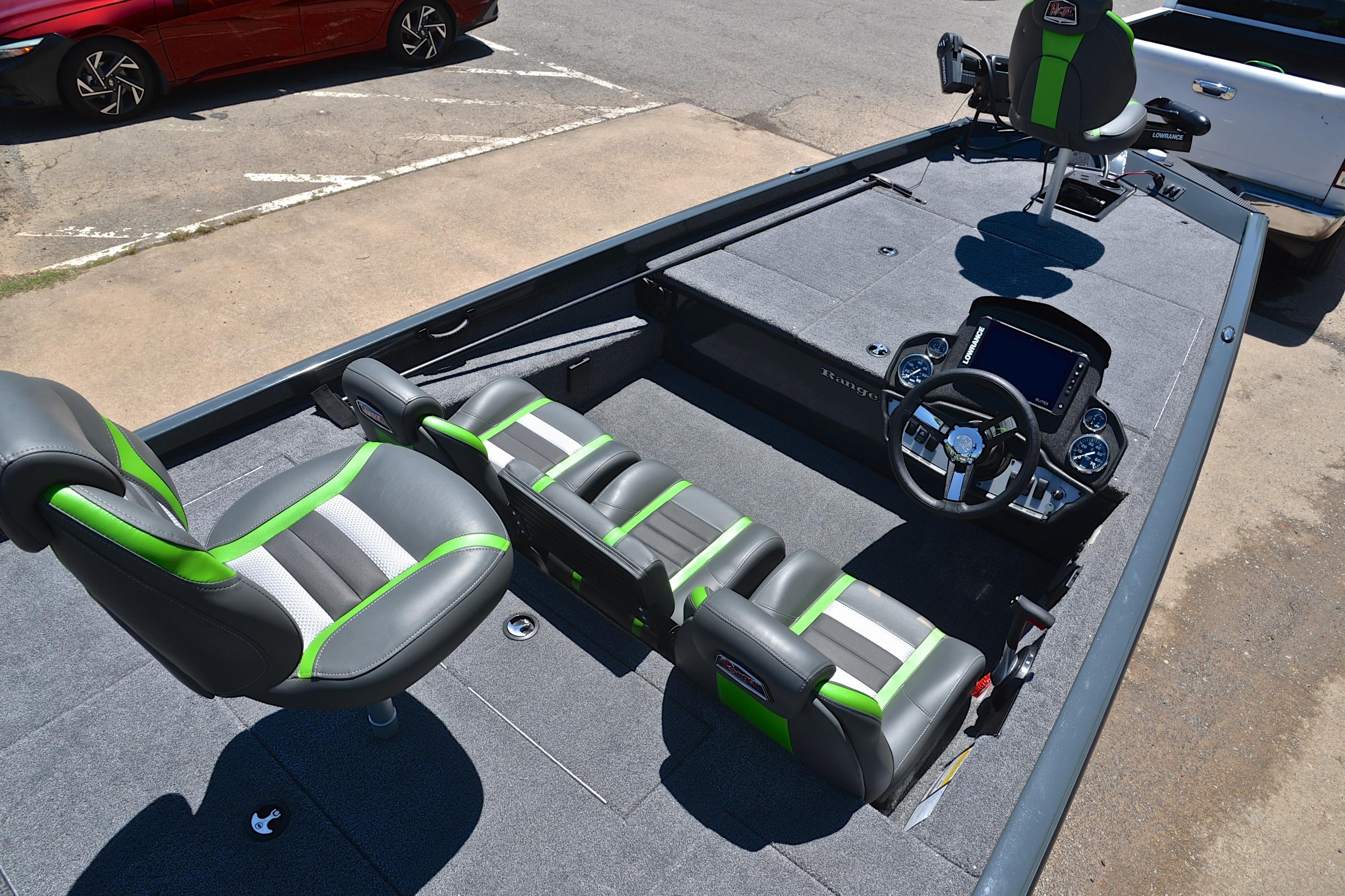 2025 Ranger RT188 boat interior with green-accented seats and modern dashboard.
