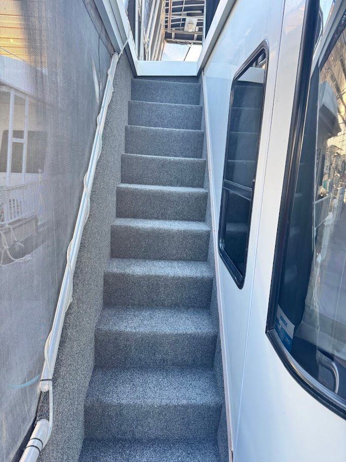 Staircase on a 2006 Summersun Houseboat 16x68.