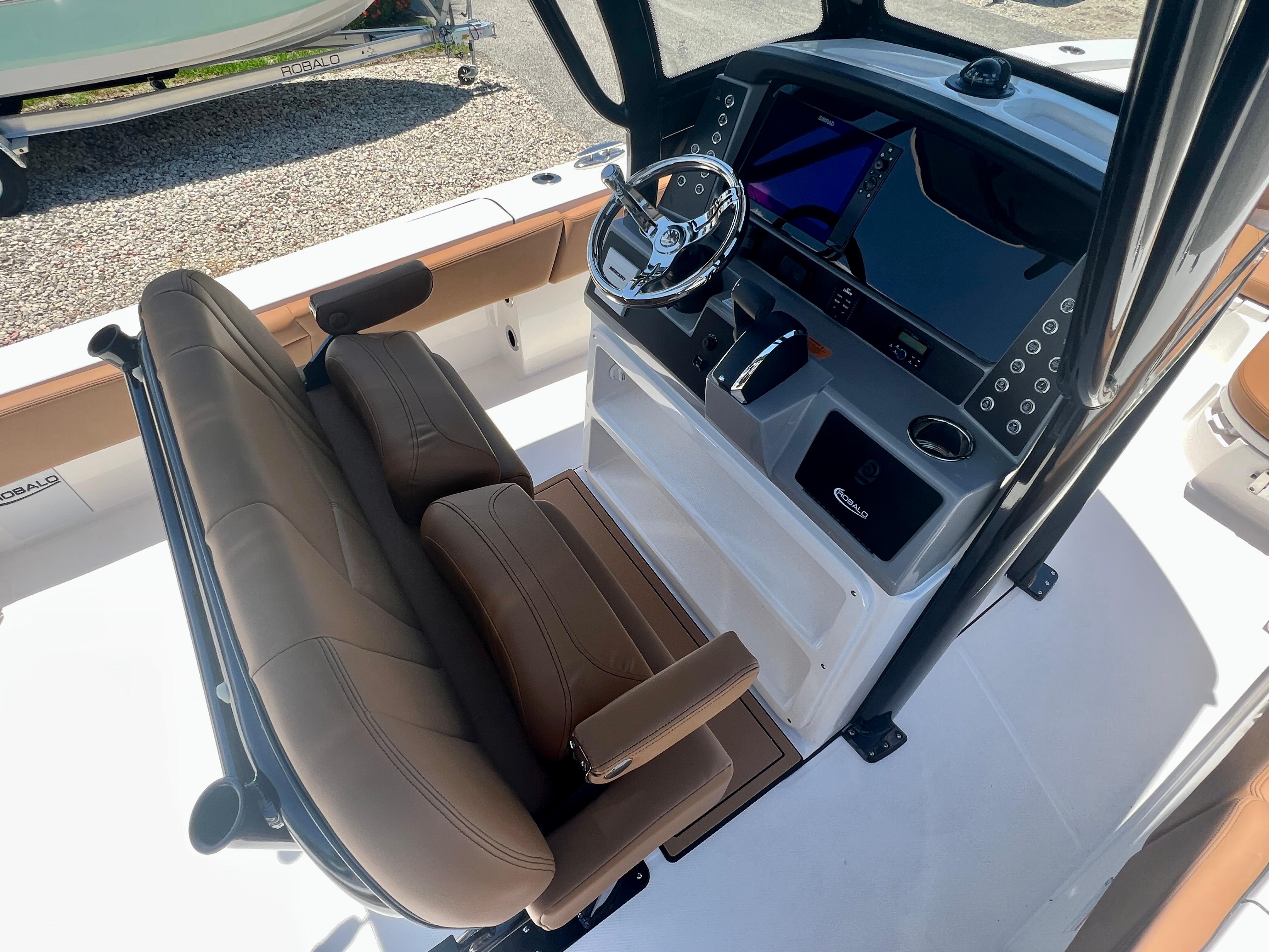 Interior view of 2025 Robalo 266 Cayman boat with helm console.