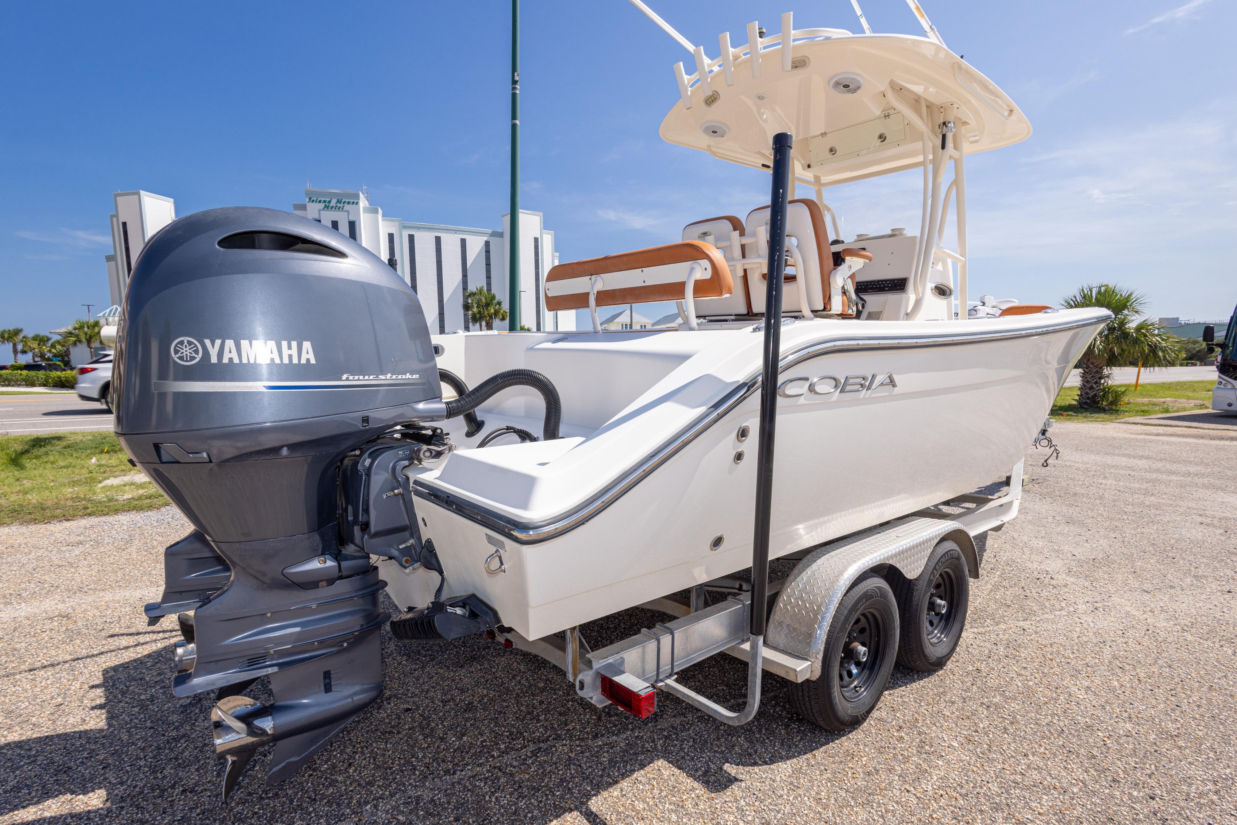 2017 Cobia 261 Center Console boat with Yamaha engine on trailer.