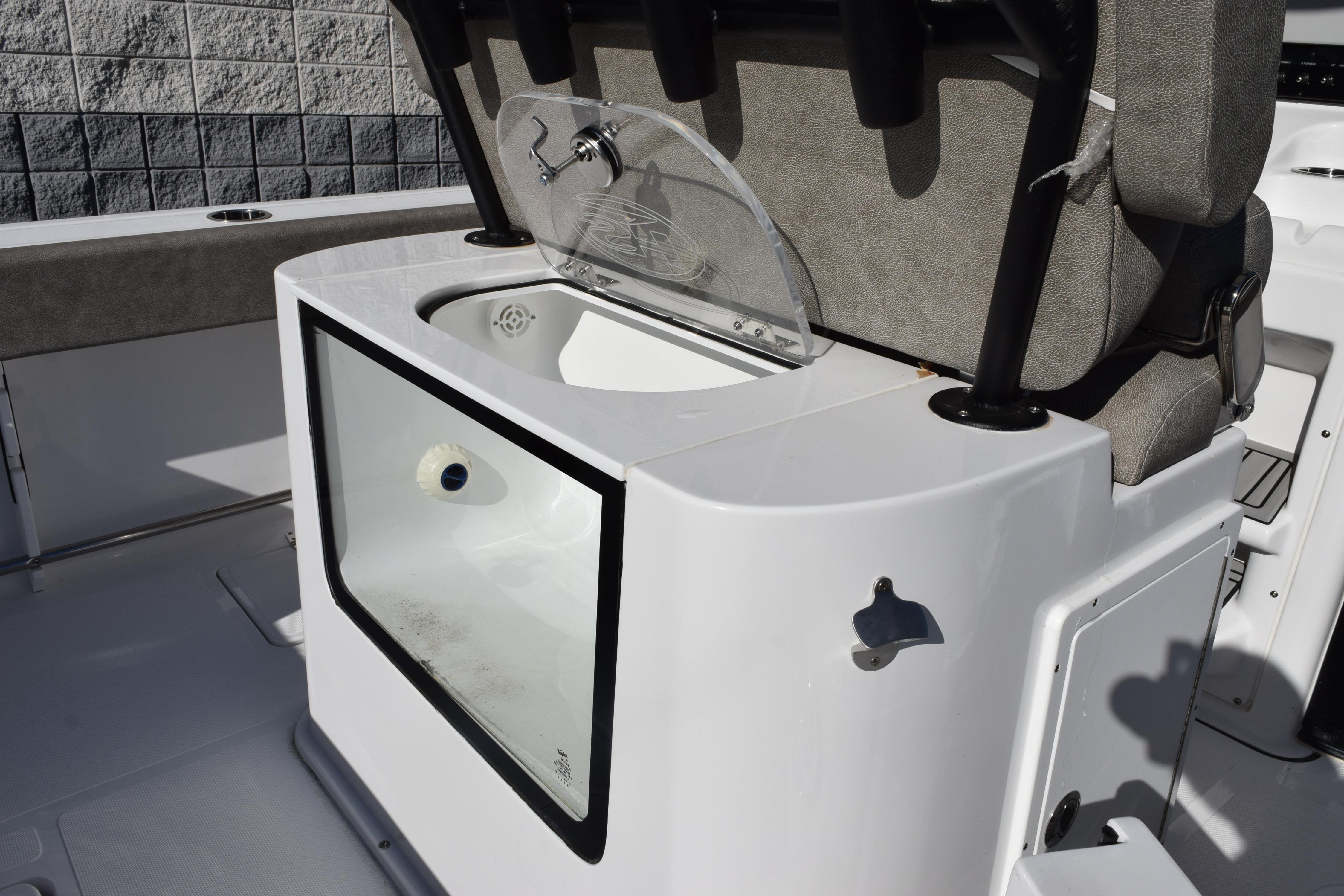 2026 Sea Hunt Gamefish 25 boat interior with livewell and seating.
