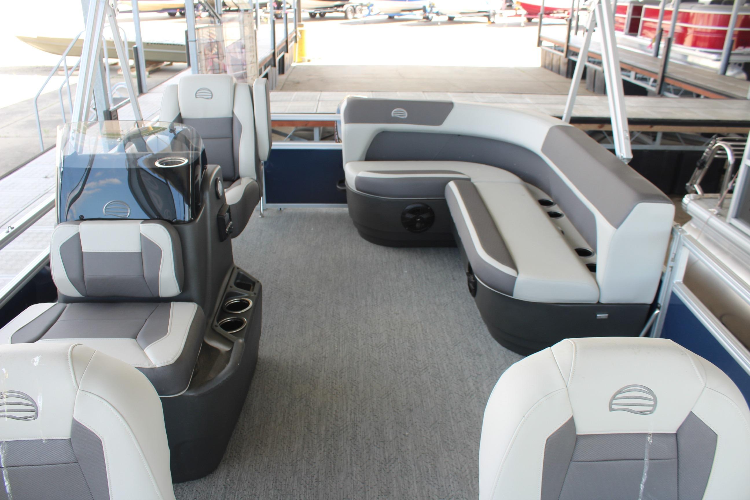 2026 Sun Tracker Bass Buggy 16 XL Select interior with gray seating and cup holders.