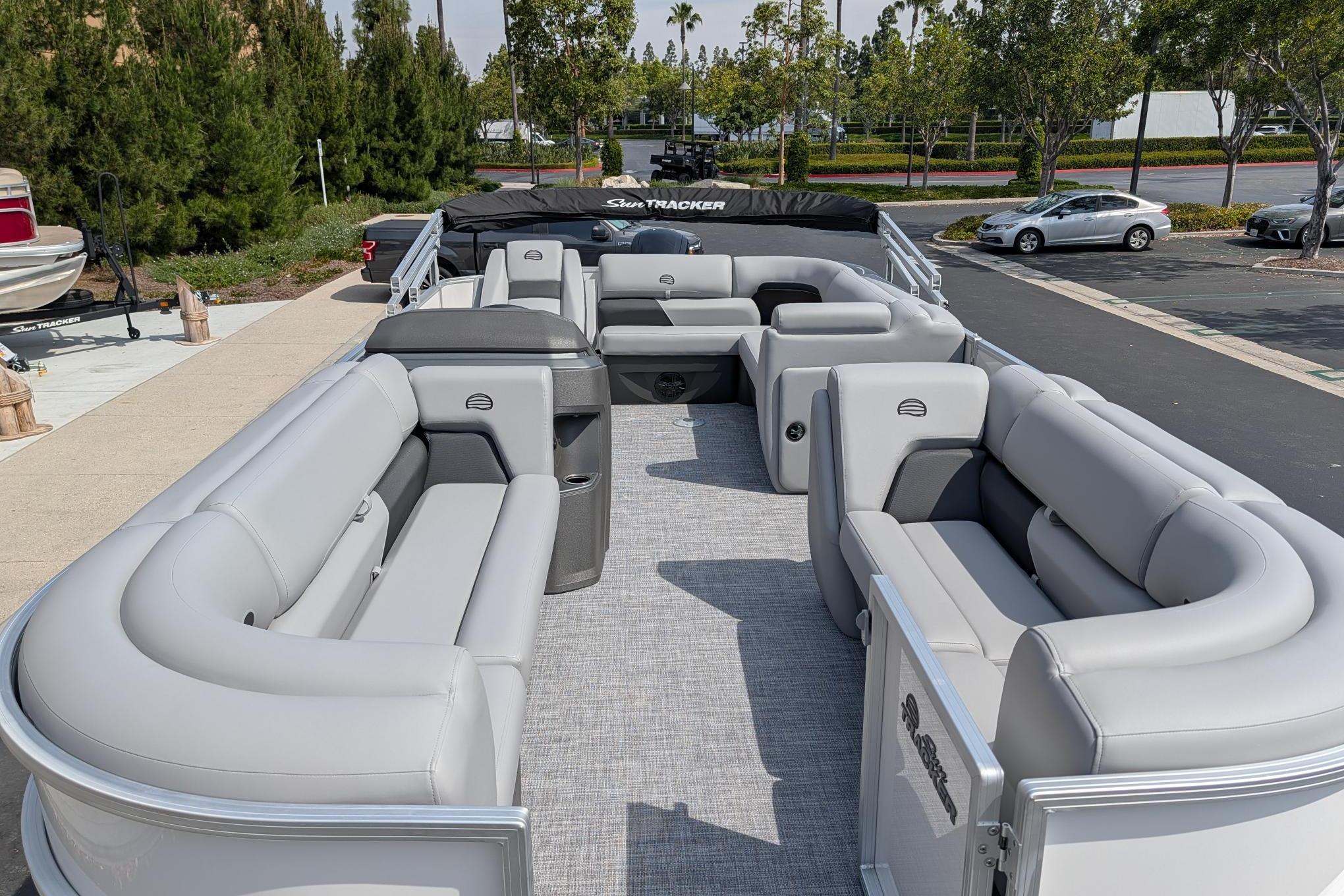 2026 Sun Tracker Party Barge 20 DLX pontoon boat with spacious seating and modern design.