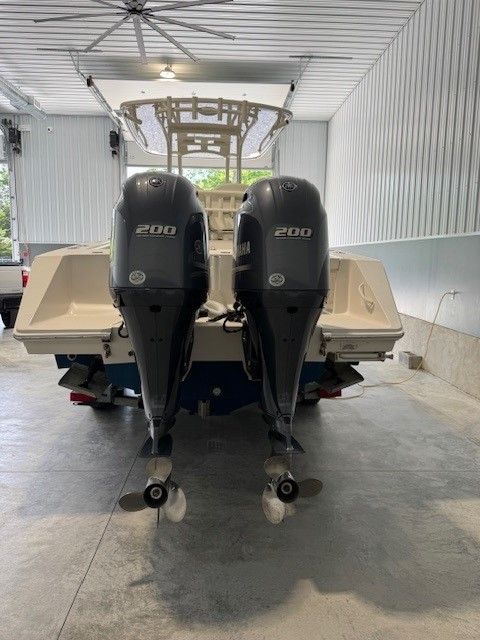 Jupiter 26 FS Center Console 2020 with twin outboard engines.