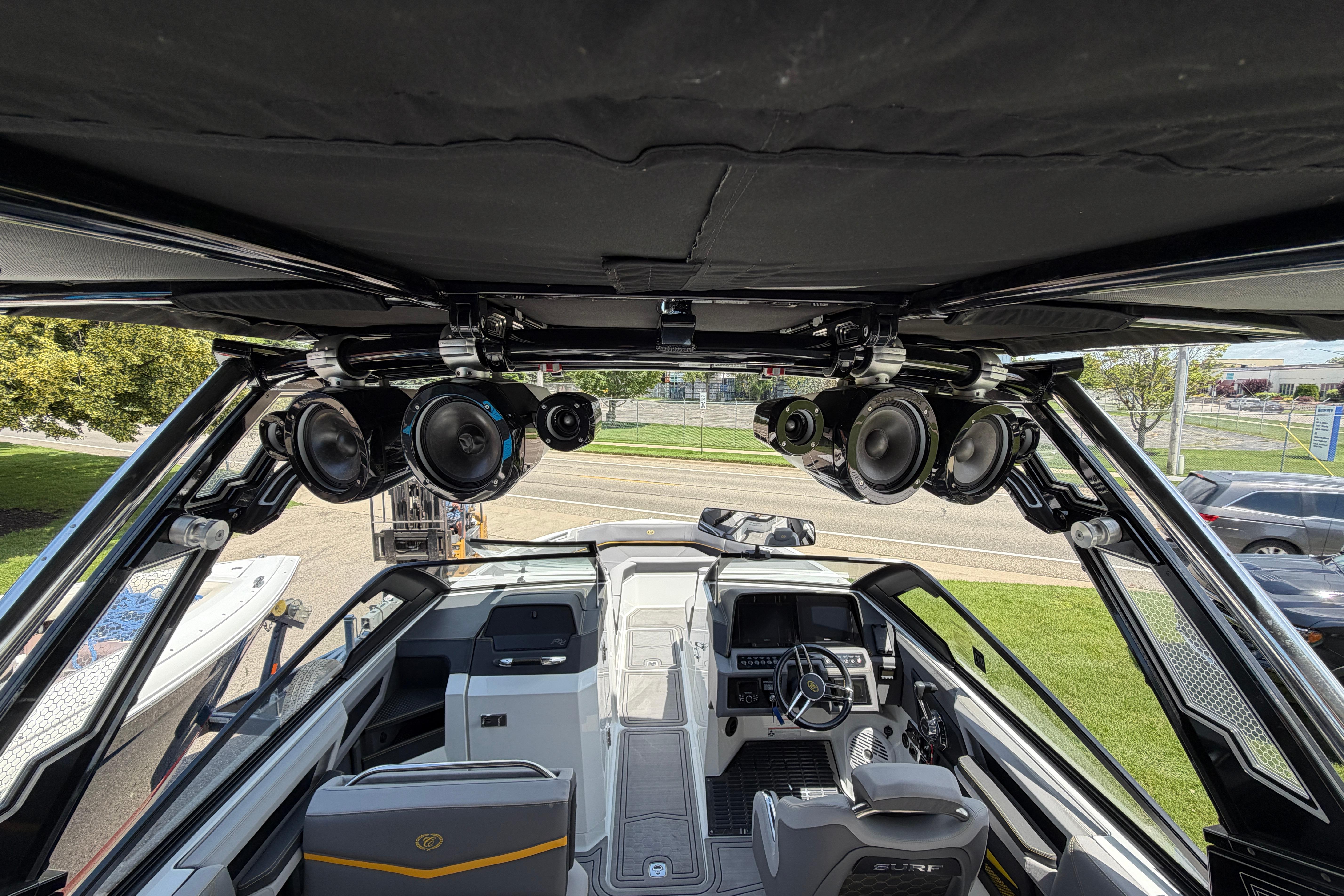 Interior view of 2021 Cobalt R8 Surf boat with advanced audio system.