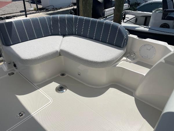 2024 Back Cove 34O boat with cushioned seating area.