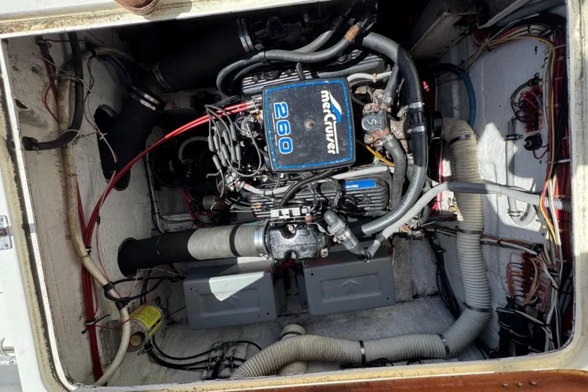 Engine compartment of a 1988 Bertram 28 Sport Fisherman with MerCruiser 260 engine.
