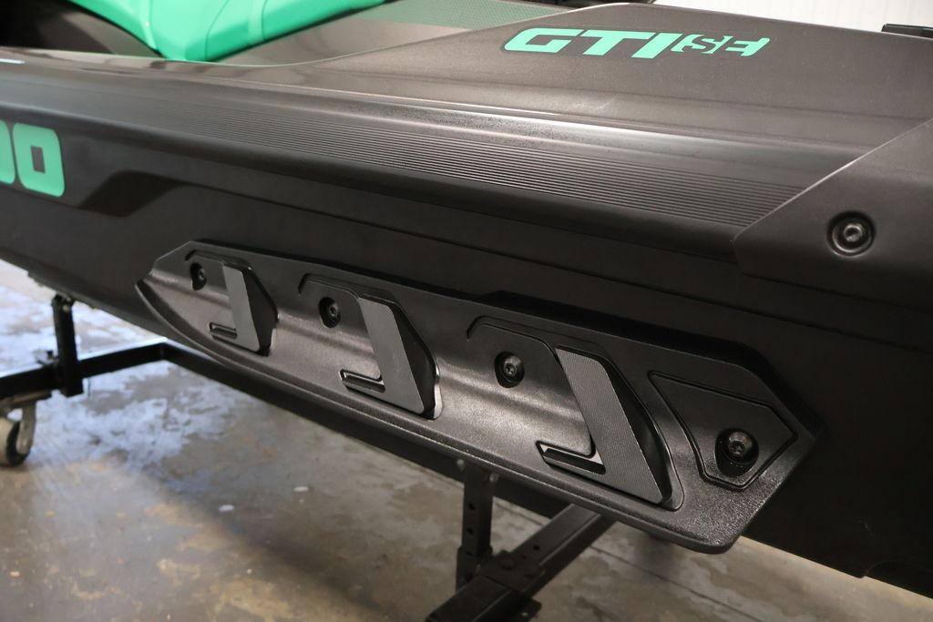 2026 Sea-Doo GTI SE 130 side view showcasing sleek design and branding.