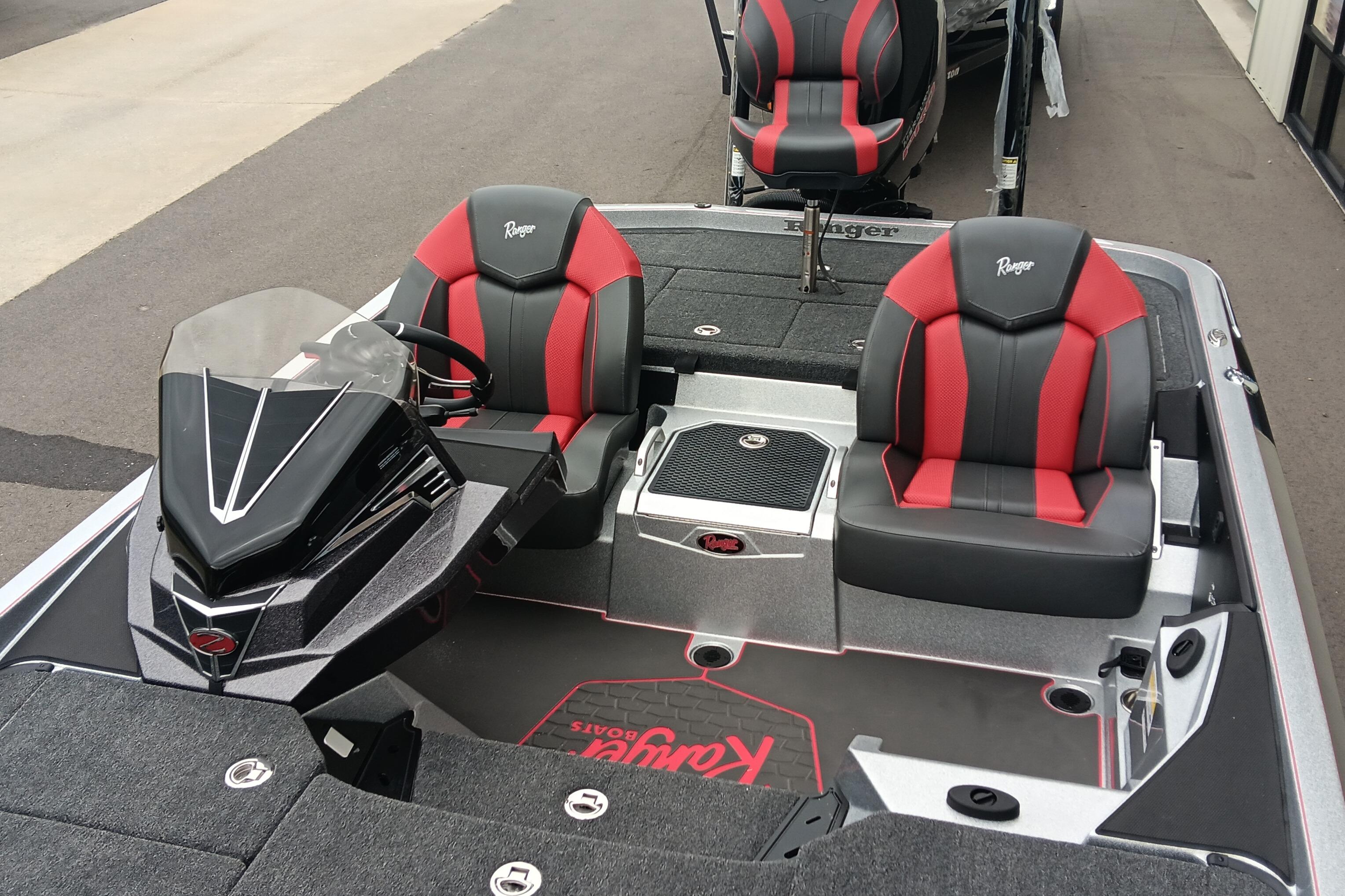 2026 Ranger Z520 boat interior with red and black seats, sleek design.