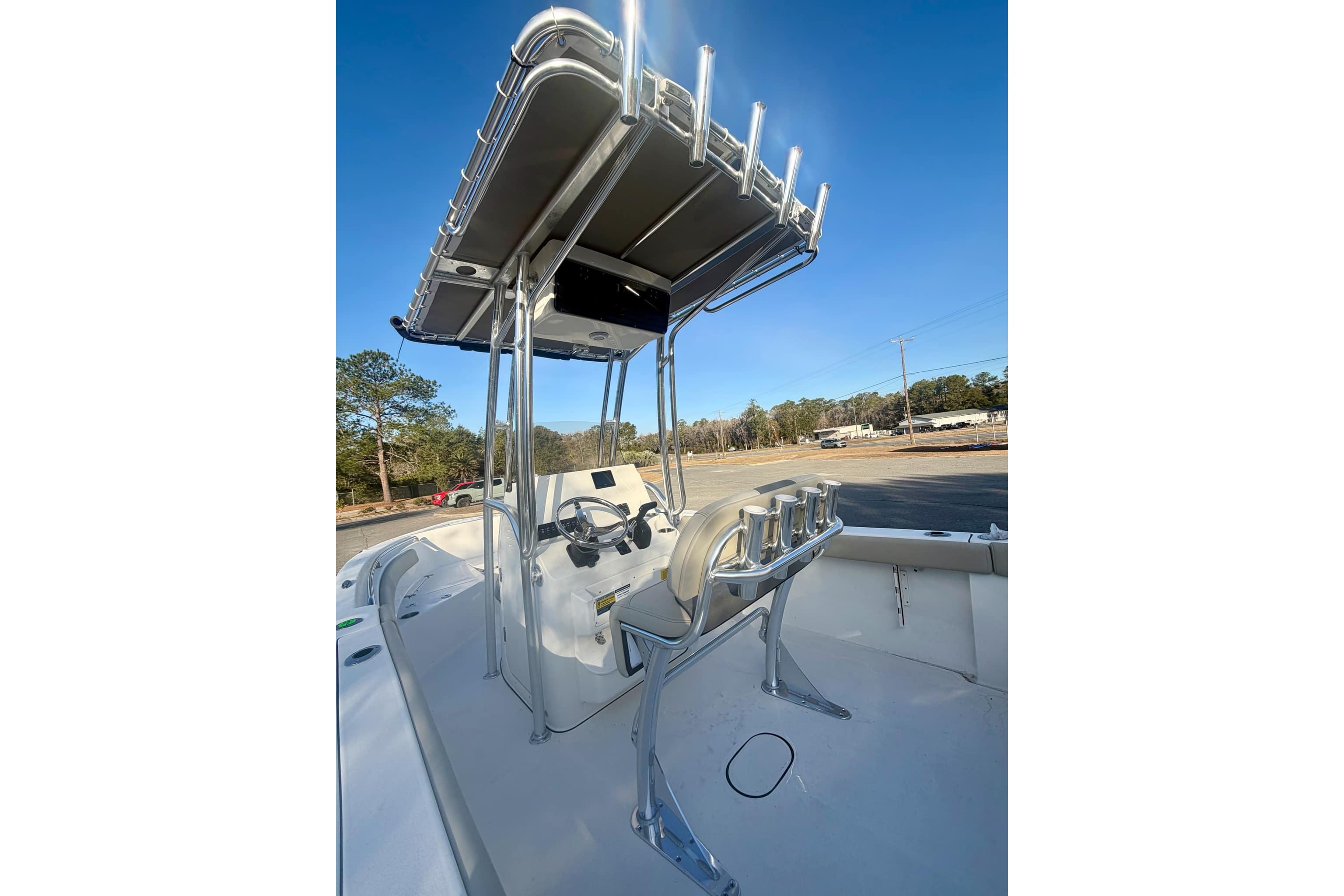 2026 Key West 203 FS boat interior with T-top and helm station.