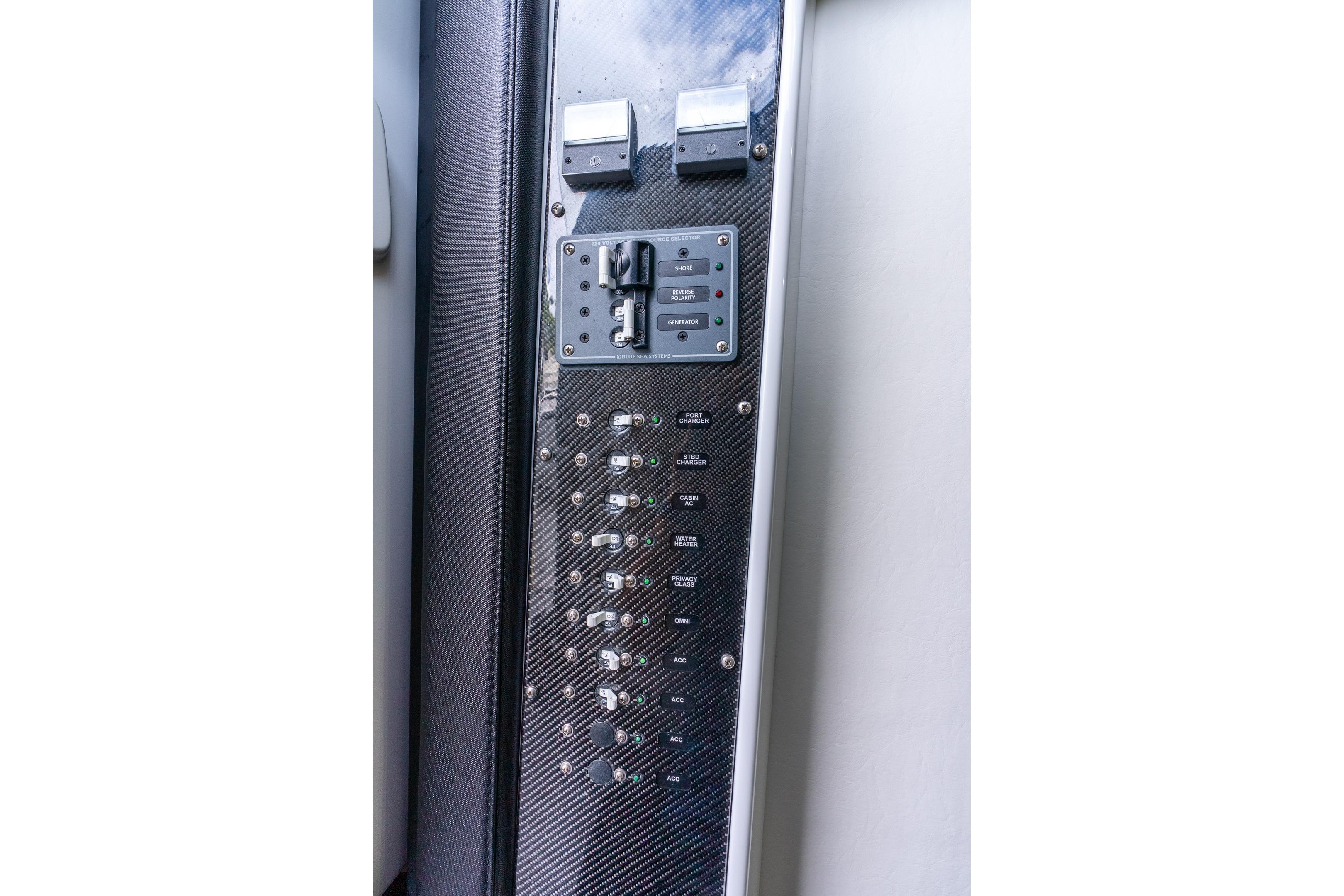 Control panel of 2024 Nor-Tech 452 Super Fish boat with switches and indicators.