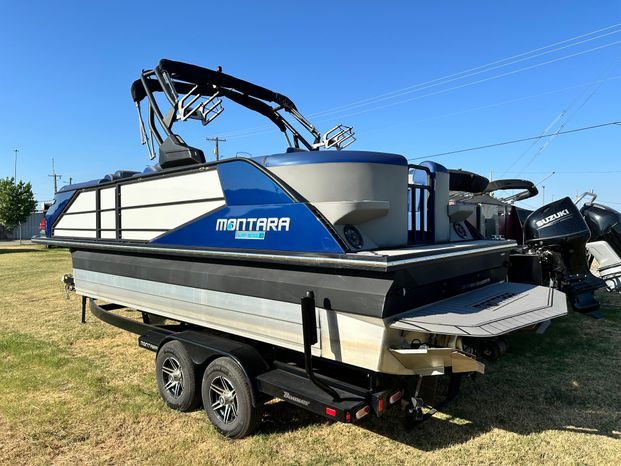 2023 Montara 25' SURF BOSS 2.0 boat on trailer.