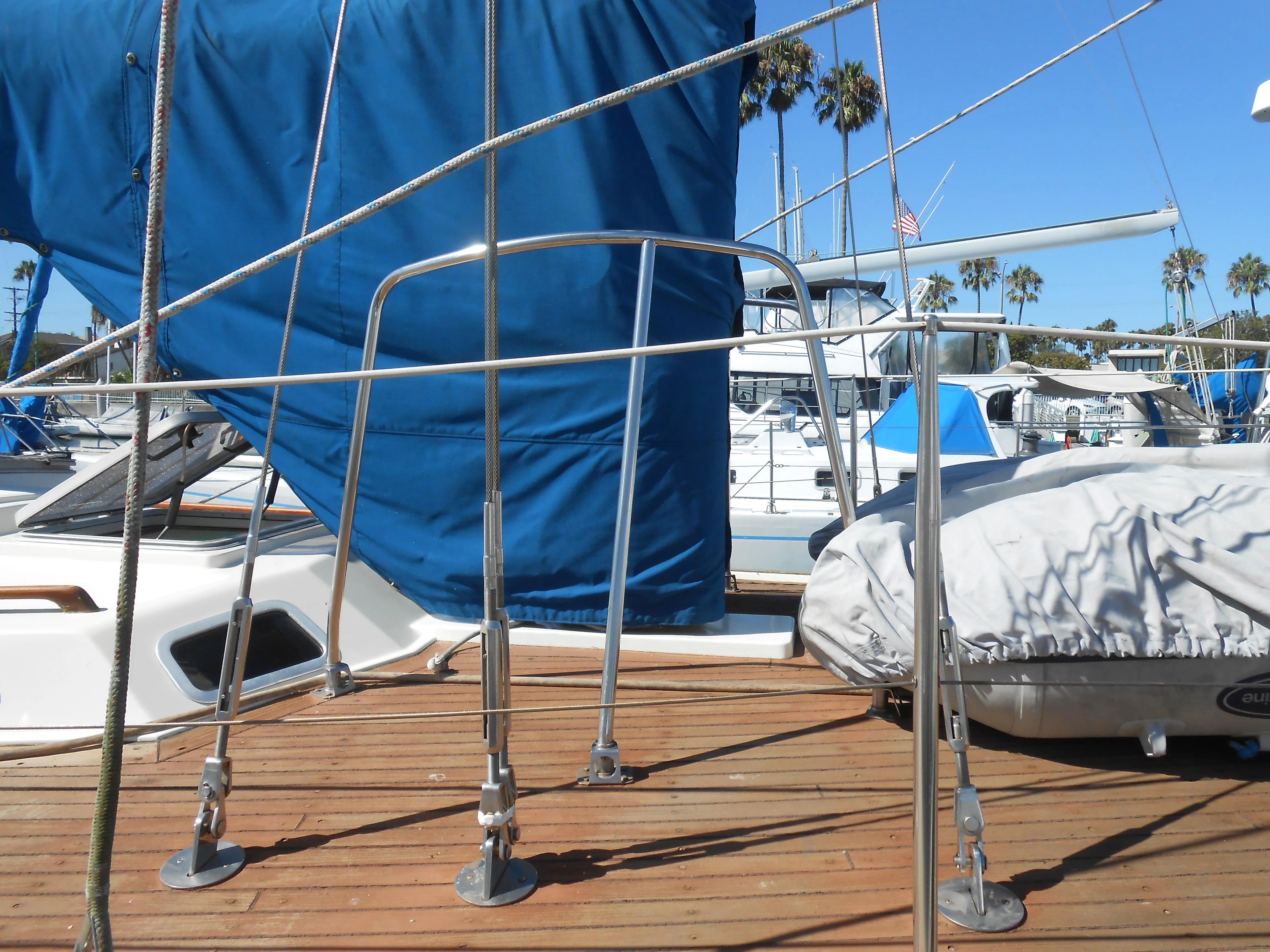 1985 Contest 41 Ketch on wooden deck with blue cover.