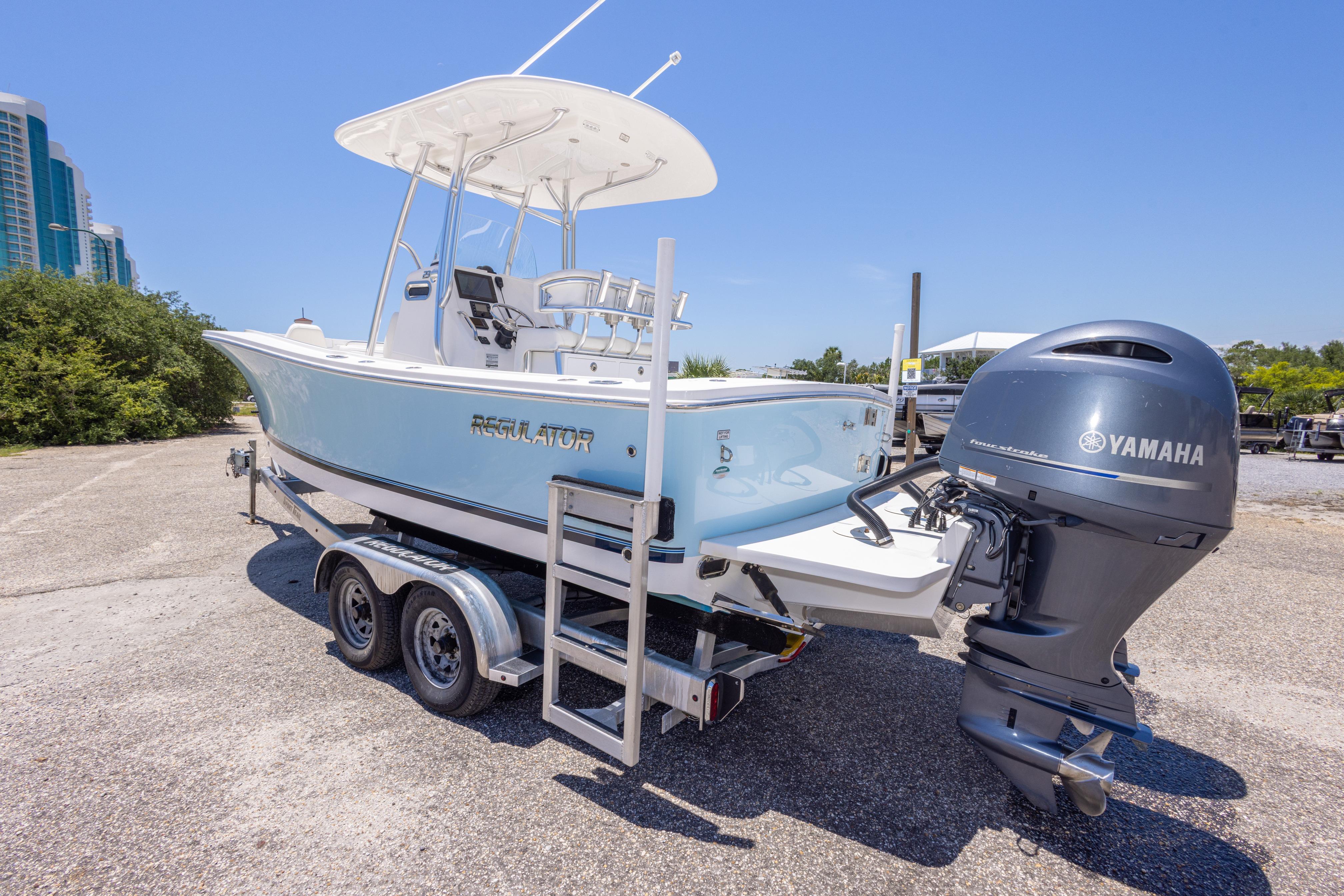 2019 Regulator 23 Center Console boat with Yamaha engine on trailer.