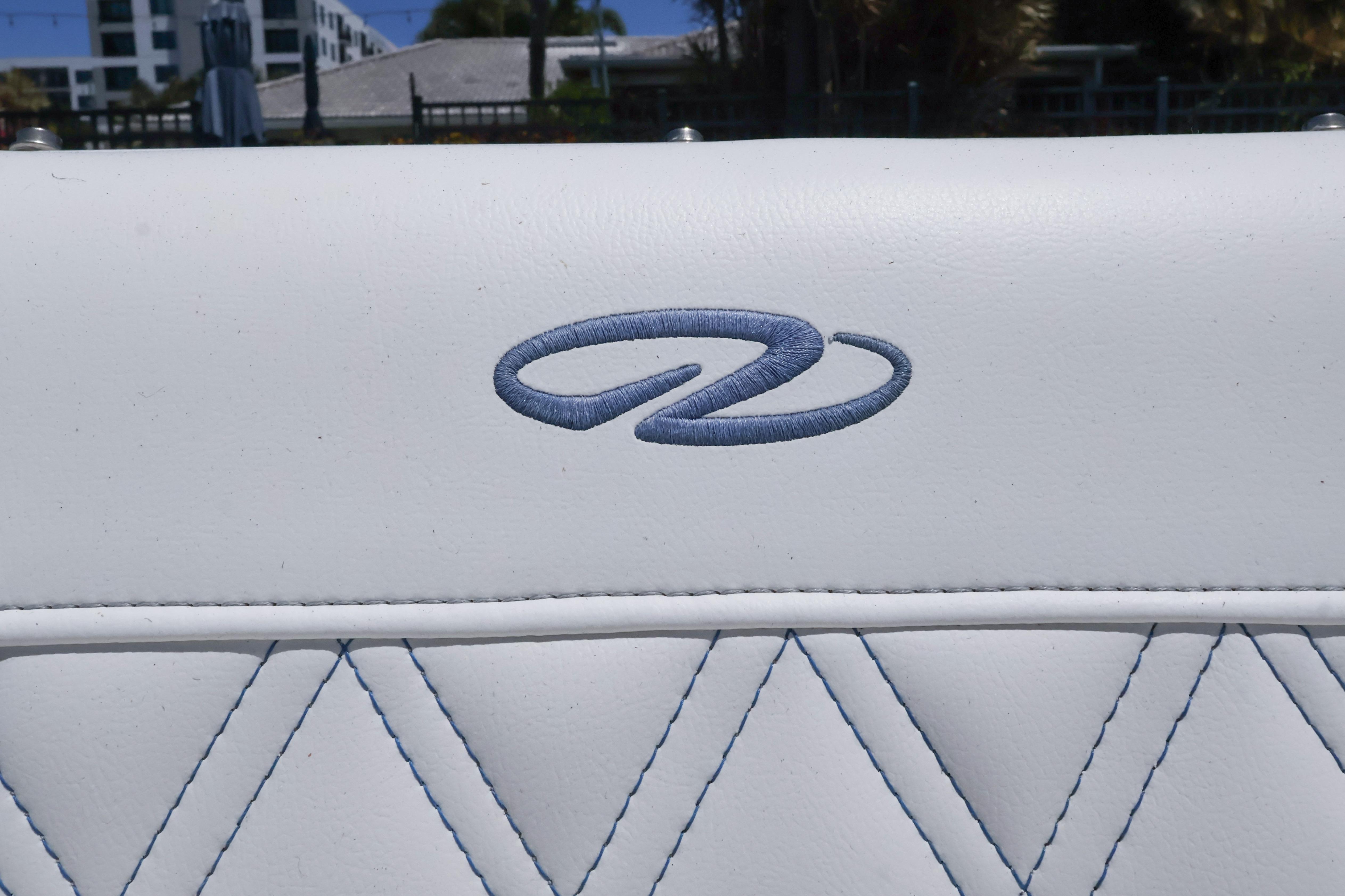 White leather seat with blue embroidered logo, Regal LX4 2020 model.