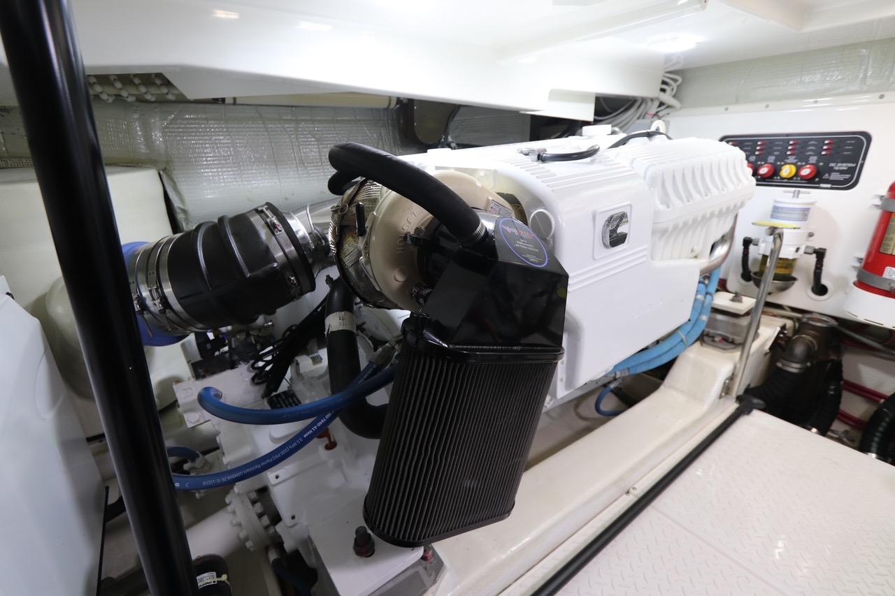 Engine room of 2020 Tiara Yachts 43 Open, showcasing advanced marine machinery.