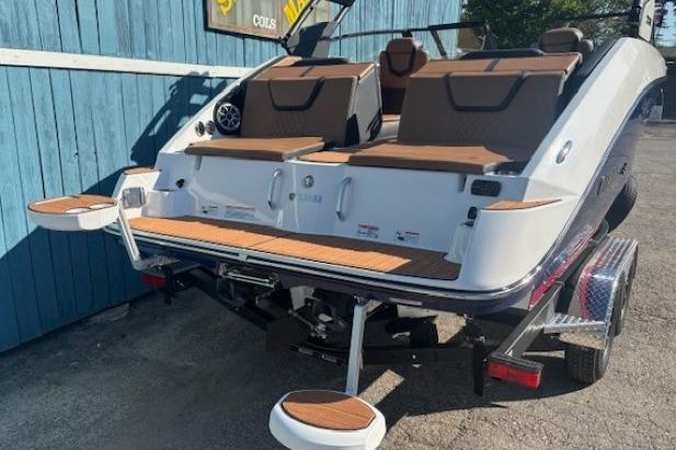2026 Yamaha Boats 222SE on trailer, featuring sleek design and comfortable seating.