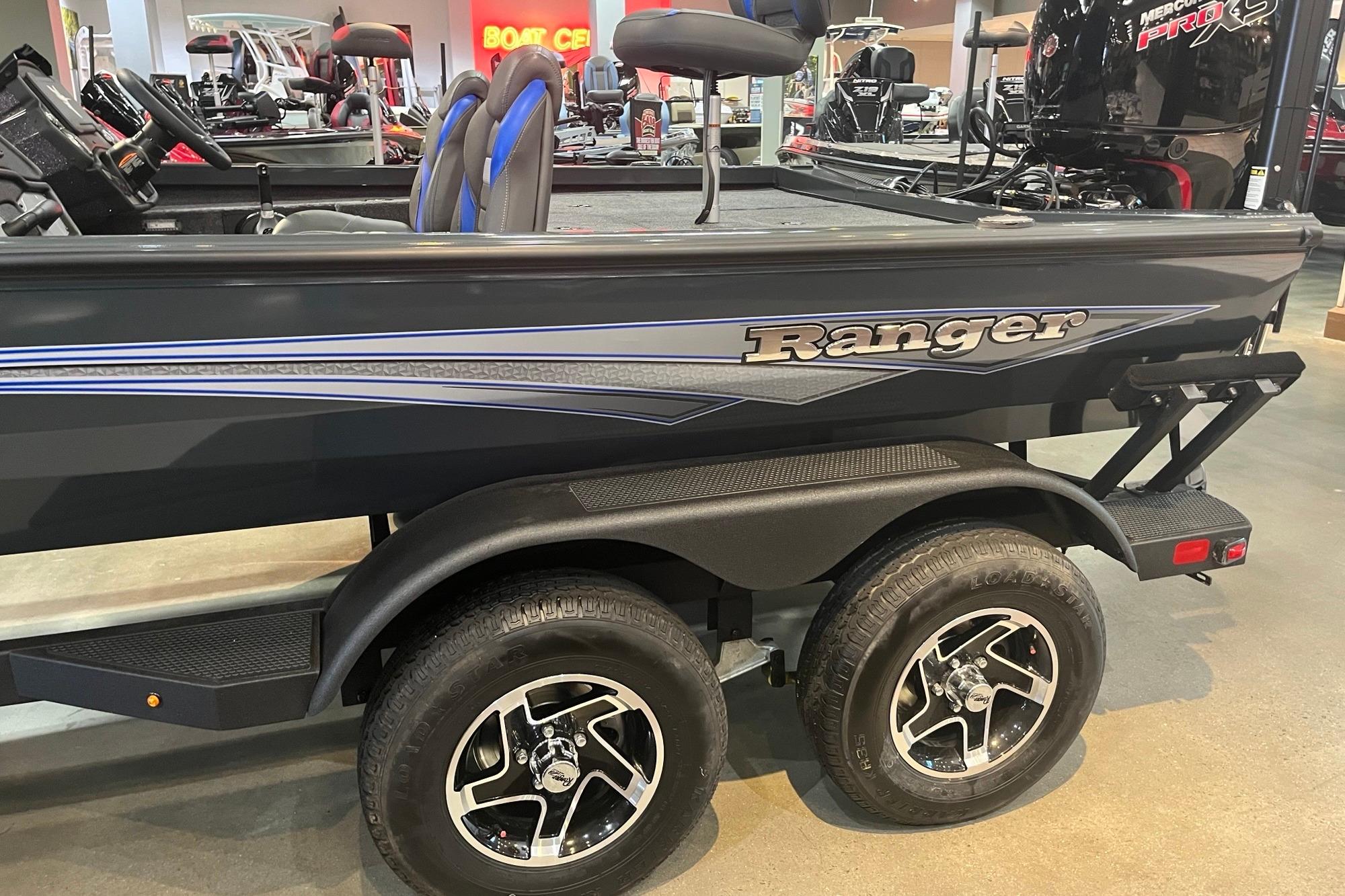 2026 Ranger RT198P boat on display, featuring dual wheels and sleek design.