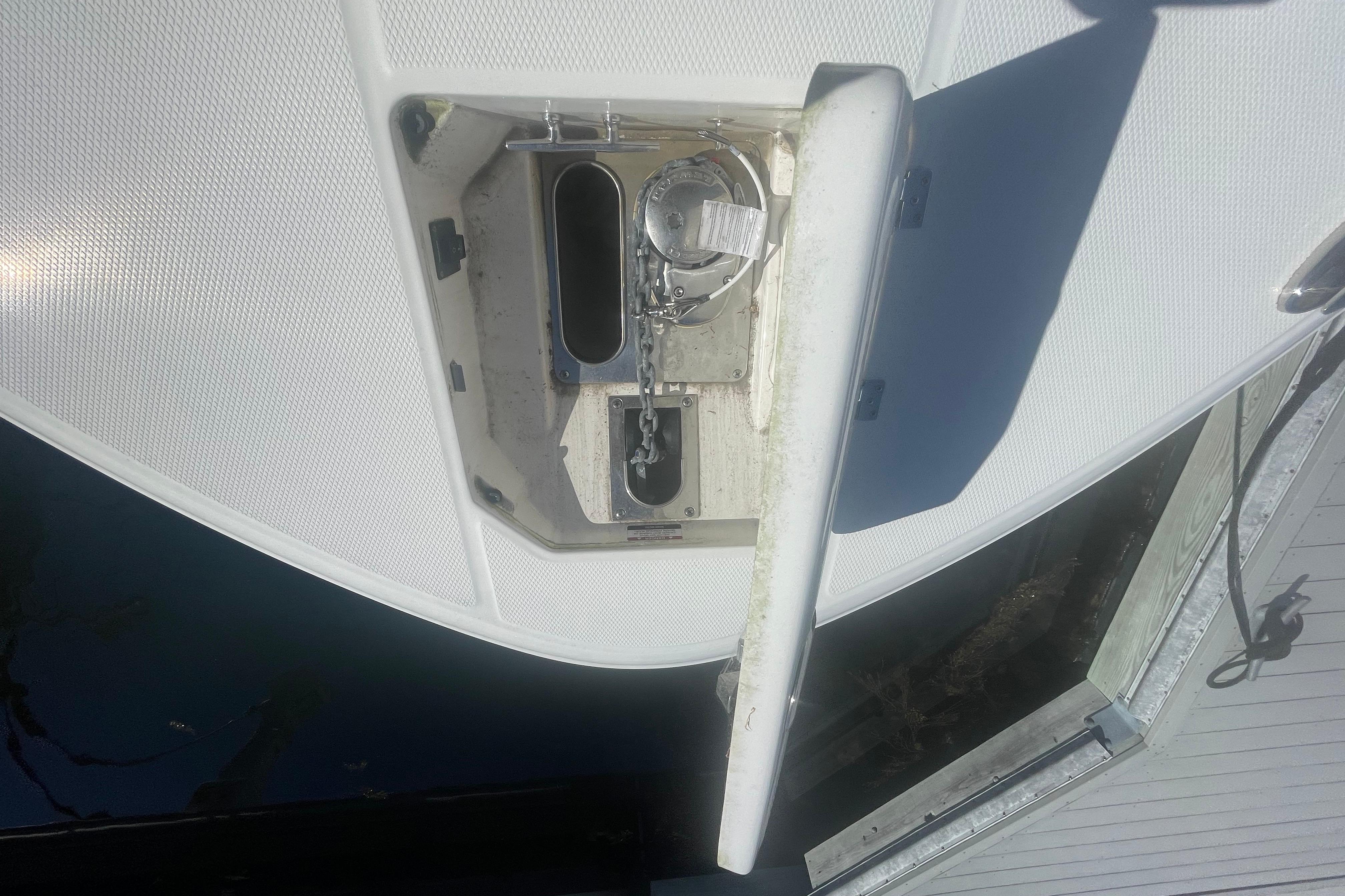 2023 Robalo R270 Center Console boat anchor compartment detail.
