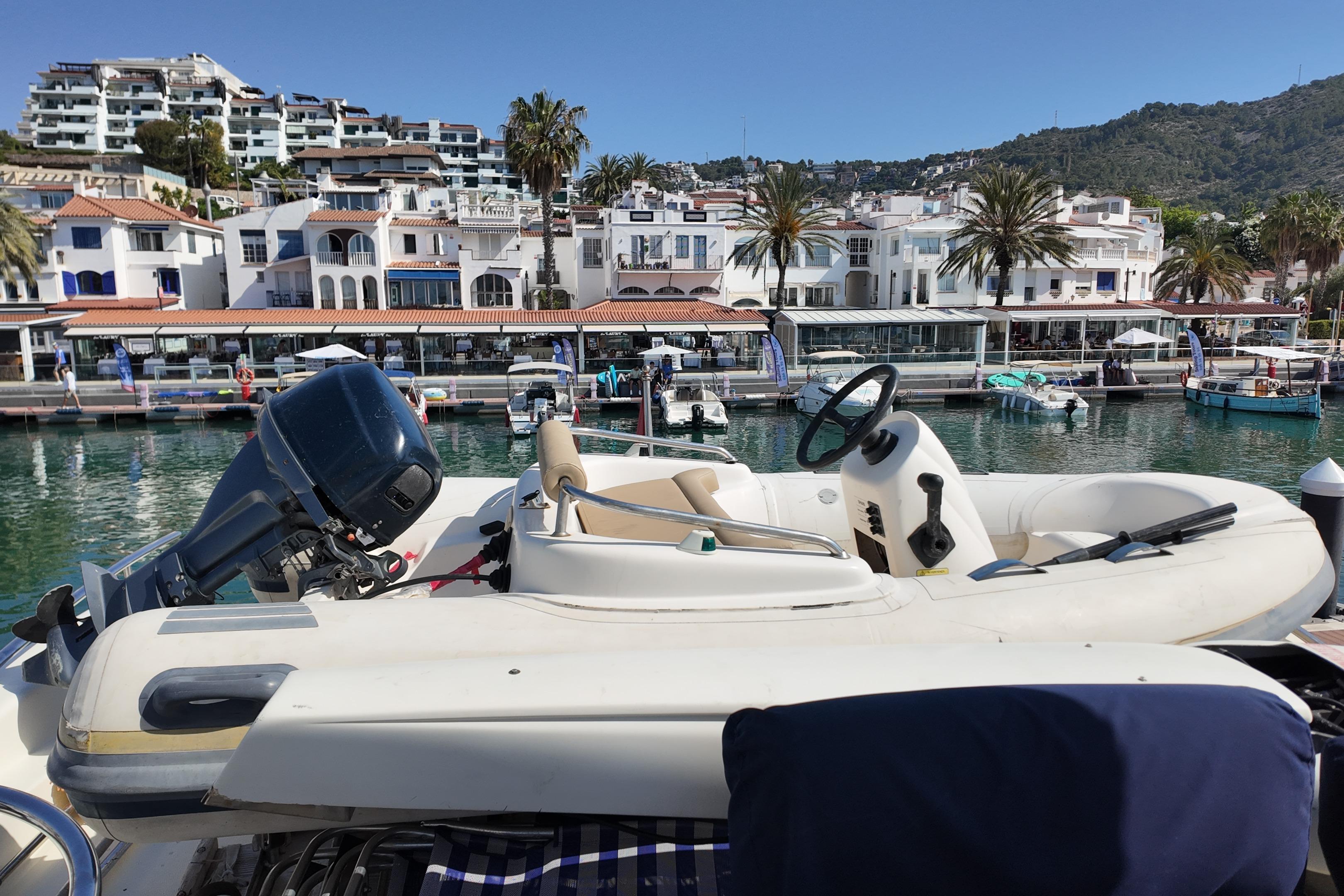 Luxury yacht Azimut 68E docked in scenic marina, 2006 model.
