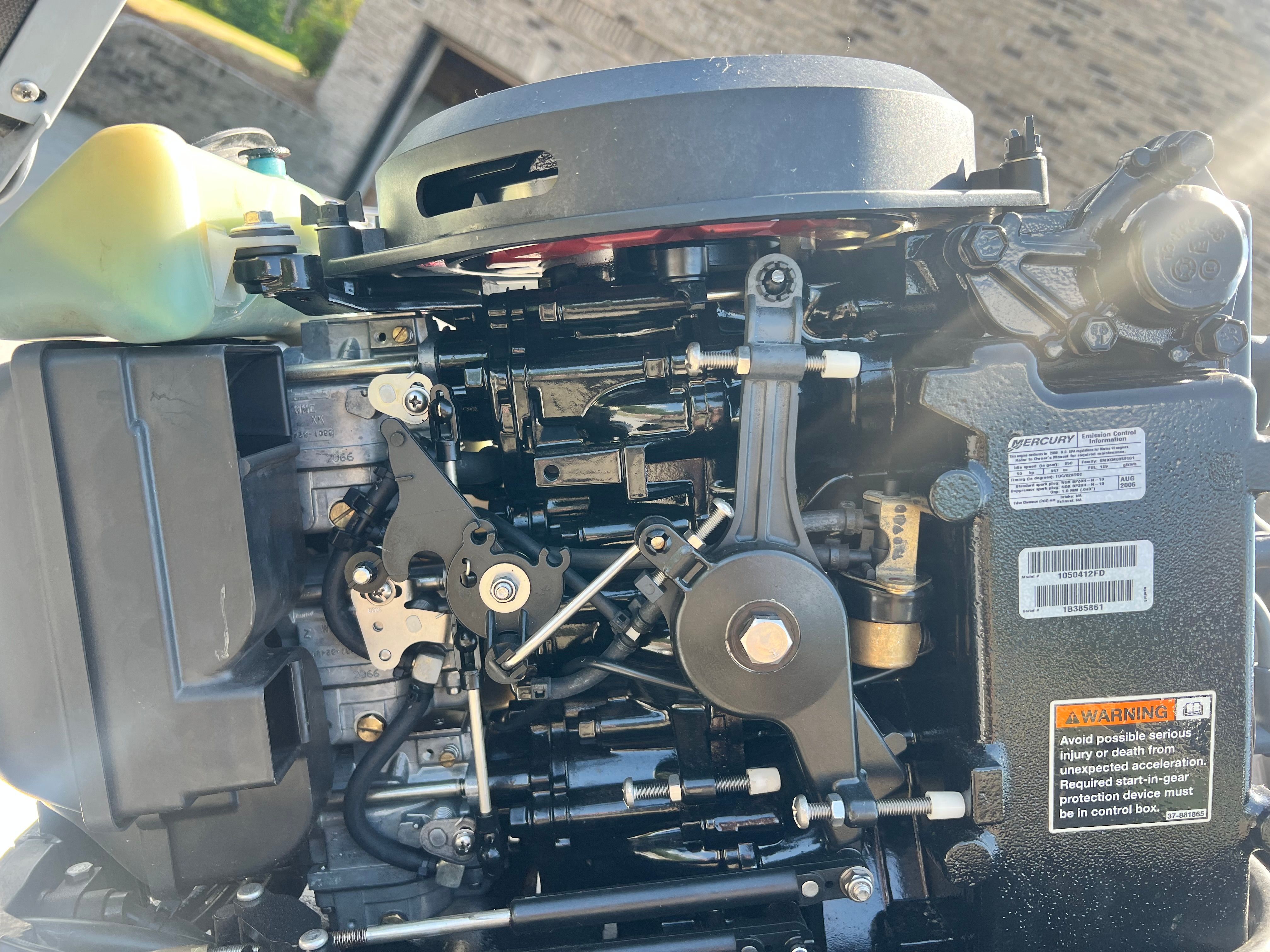 Close-up of a Mercury outboard motor on a 2007 Bass Tracker Pro 170.