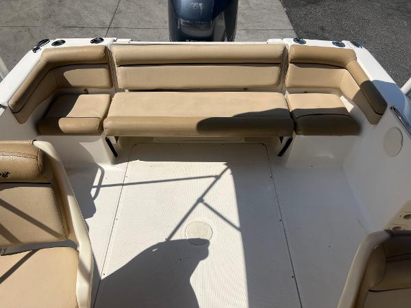 2019 Scout 210 Dorado boat interior with beige seating and white deck.