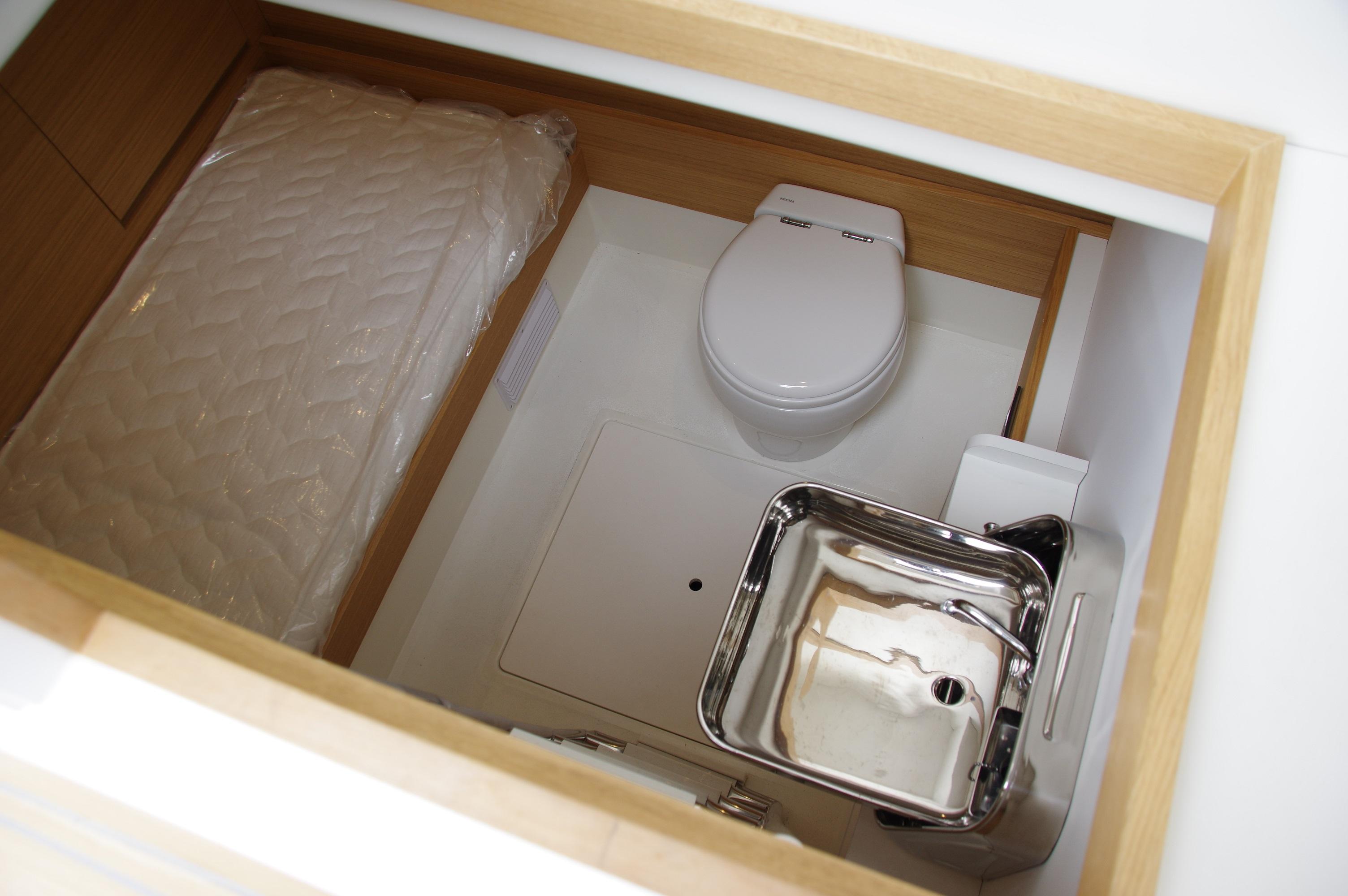 2025 Pardo Yachts 50 interior bathroom with toilet and sink.