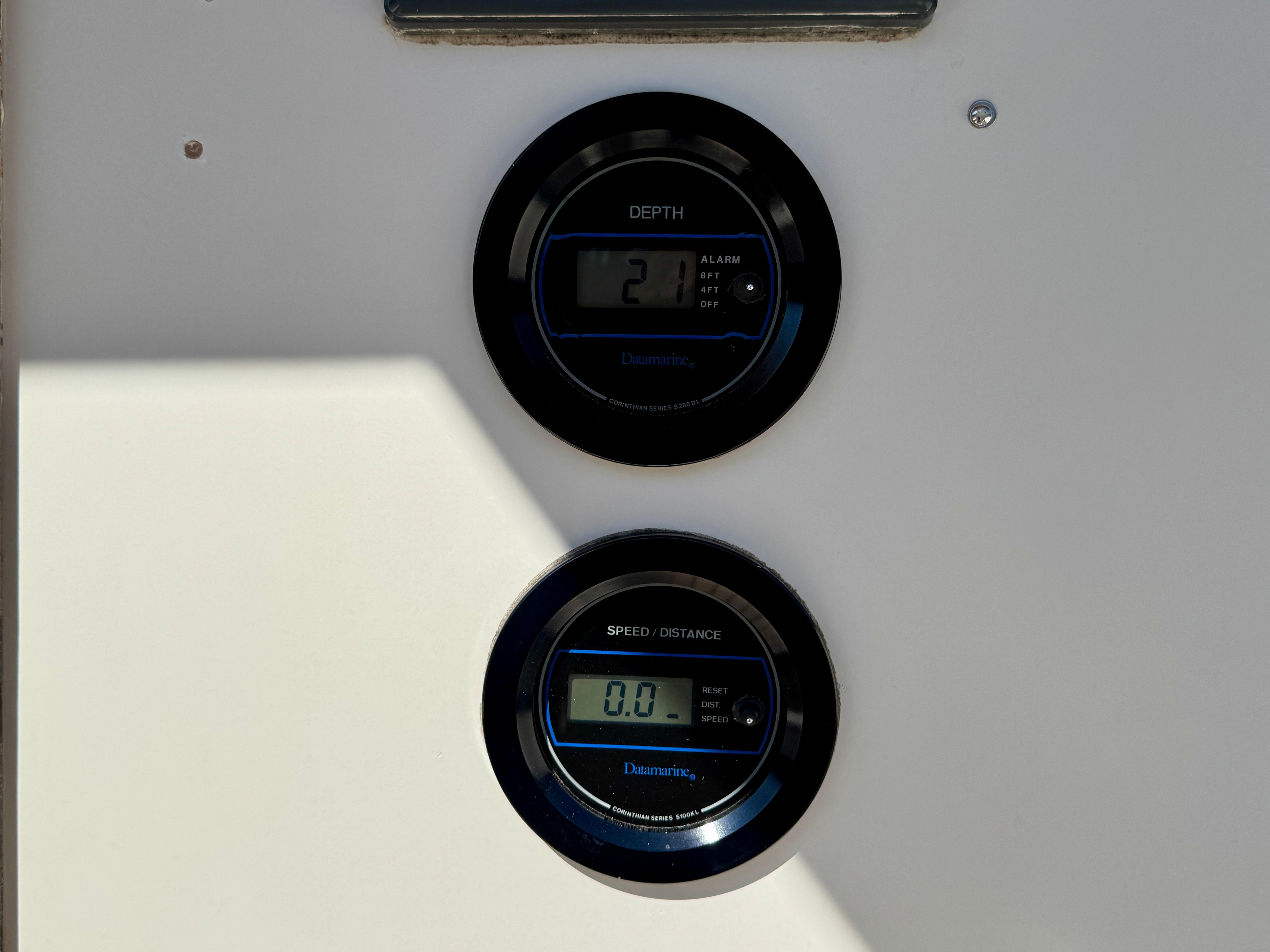 Digital depth and speed gauges on a 1989 Nonsuch 30 Ultra sailboat.