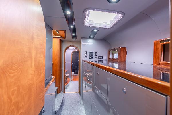 Interior of 2025 Shuttleworth 52 AeroRig yacht, featuring modern design and wood accents.