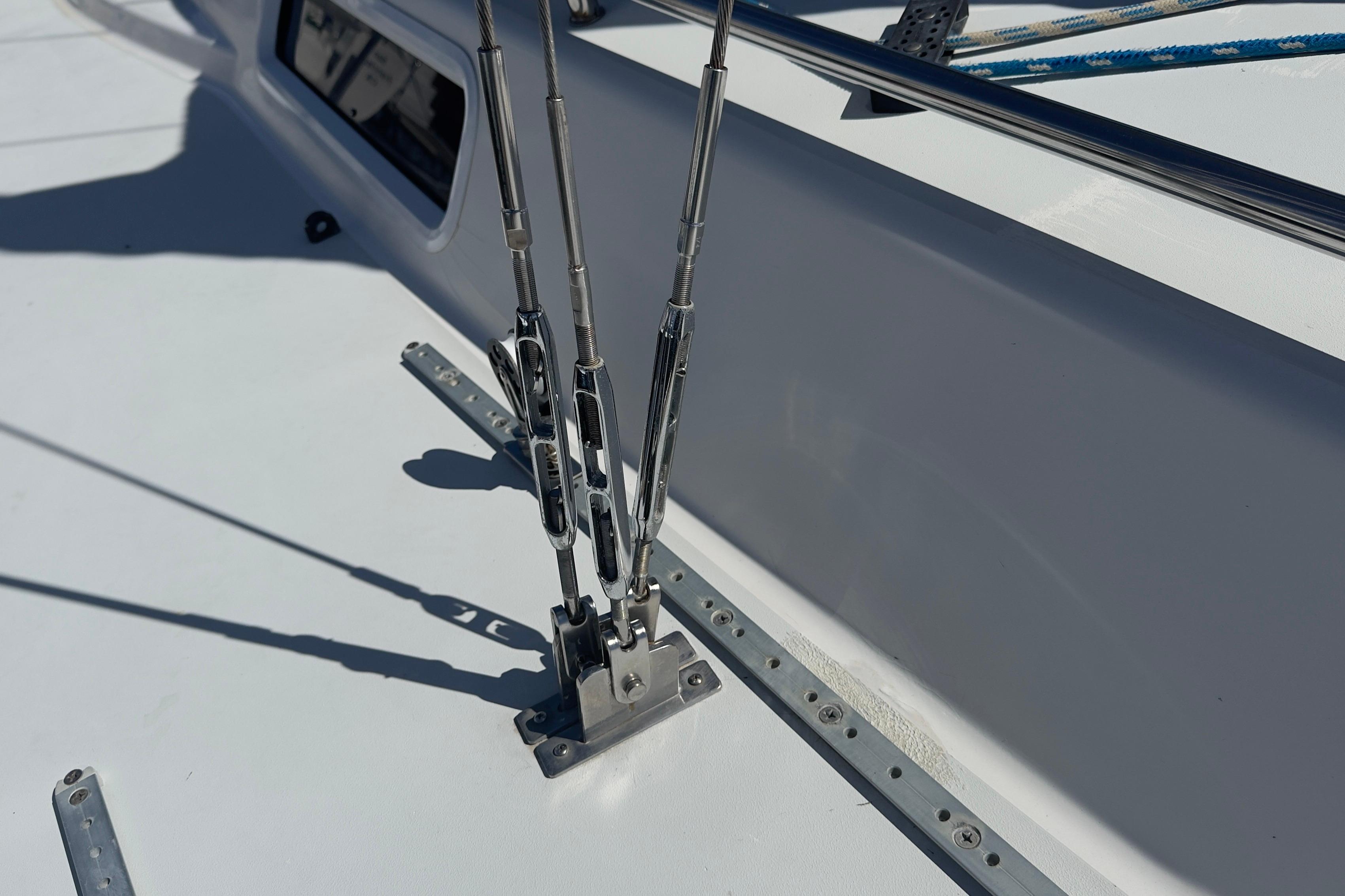 Close-up of rigging hardware on a 1994 J Boats J/92 sailboat deck.